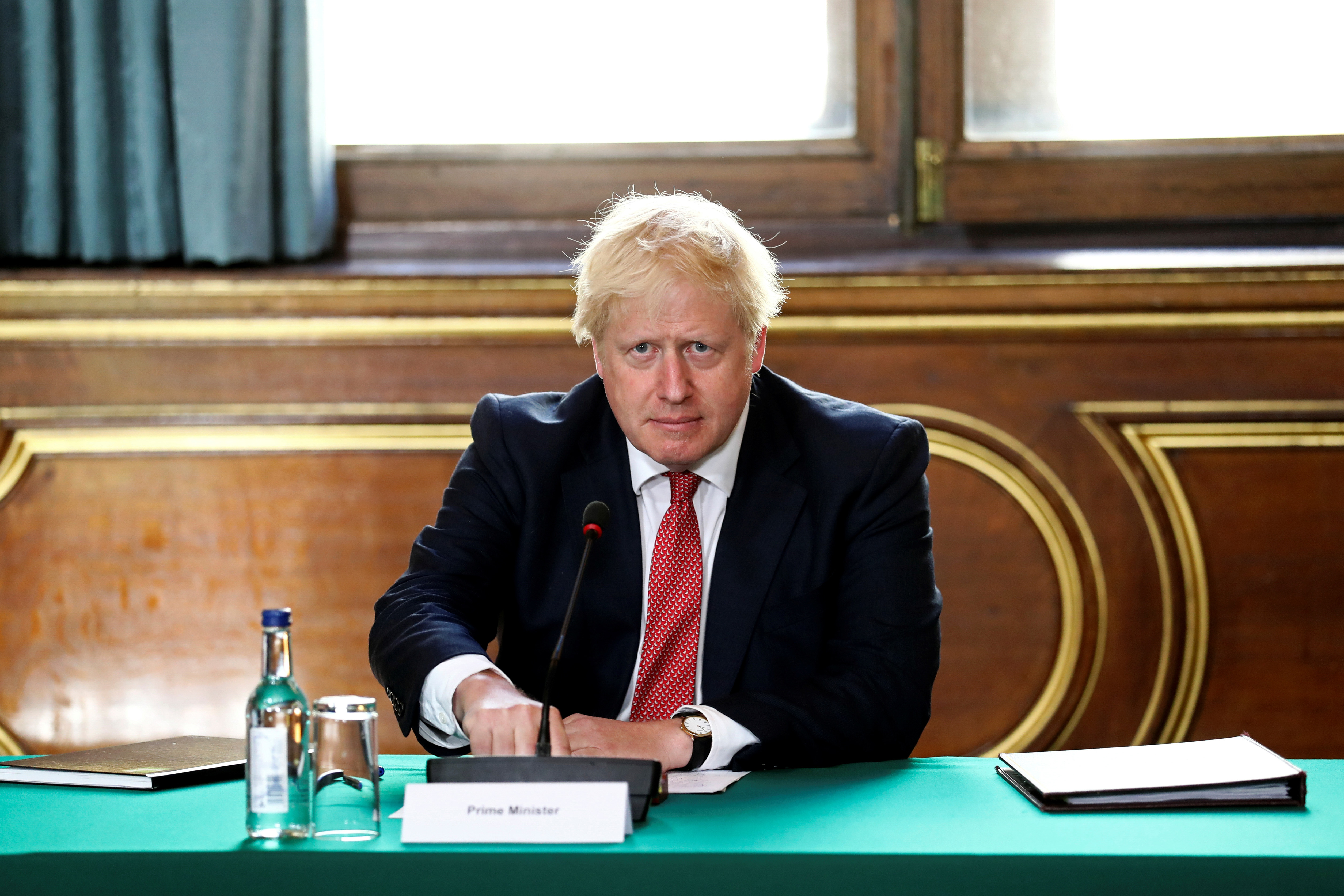 Prime Minister Boris Johnson chairs a face-to-face meeting of his cabinet team of ministers, the first since mid-March, on July 21, 2020 in London, England.