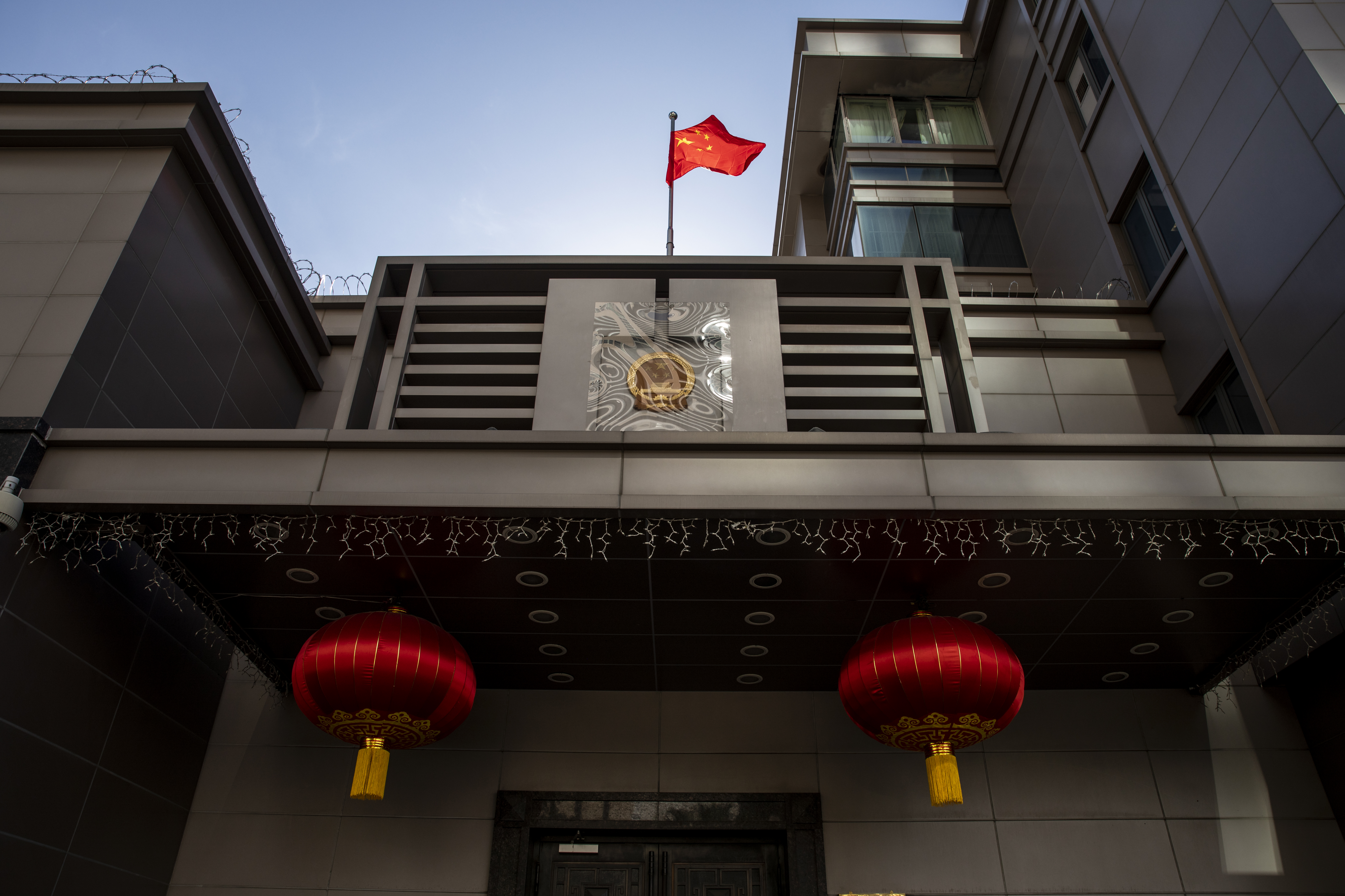 The Chinese flag stands on display outside the China Consulate General building in Houston, Texas, U.S., on Wednesday, July 22, 2020. China vowed retaliation after the U.S. forced the closure of its Houston consulate, prompting stocks to fall in one of the biggest blows to diplomatic ties between the two countries in decades.