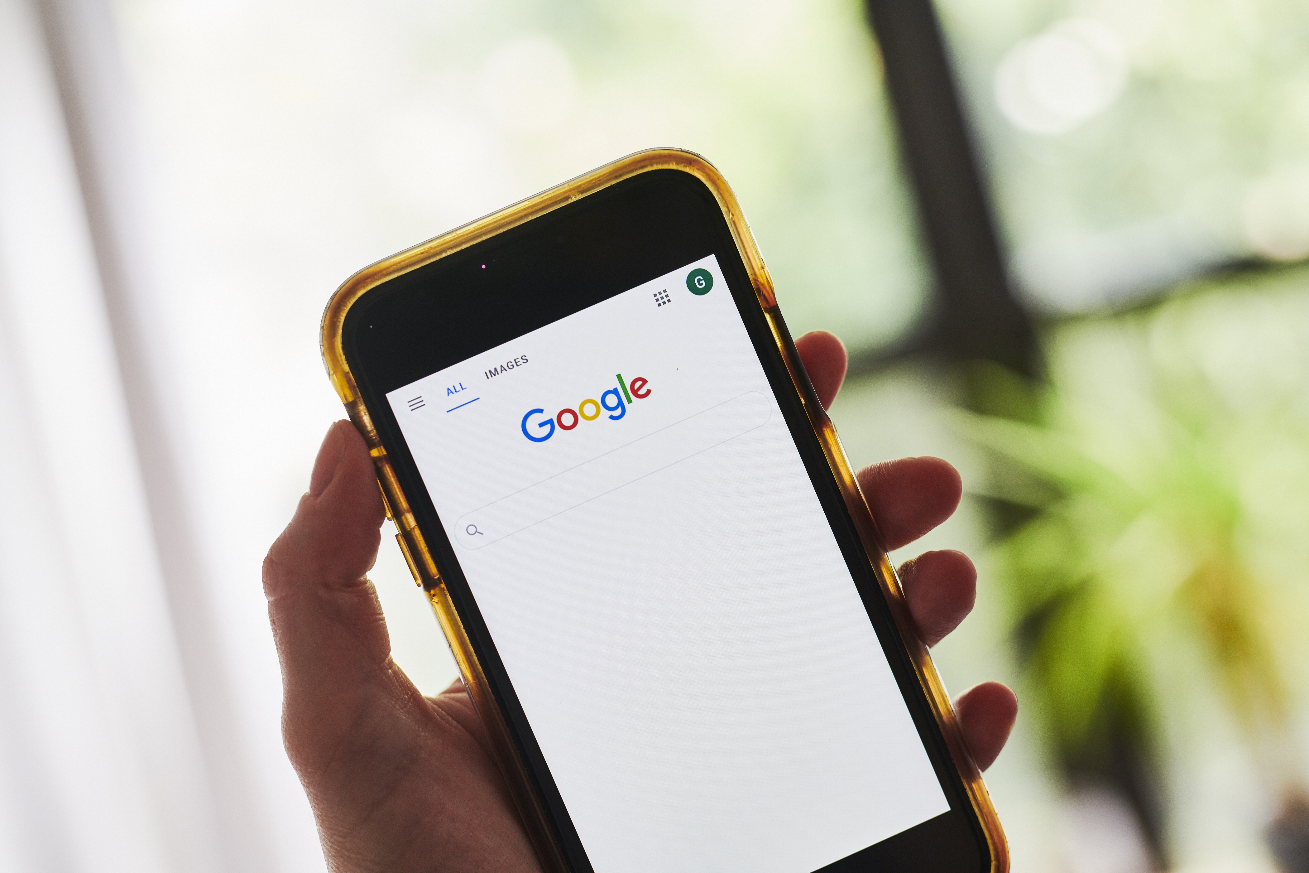 The Alphabet Inc. Google search page is displayed on a smartphone in an arranged photograph taken in the Brooklyn Borough of New York, U.S., on Friday, July 24, 2020. Alphabet Inc. is scheduled to release earnings figures on July 30. Photographer: Gabby Jones/Bloomberg via Getty Images