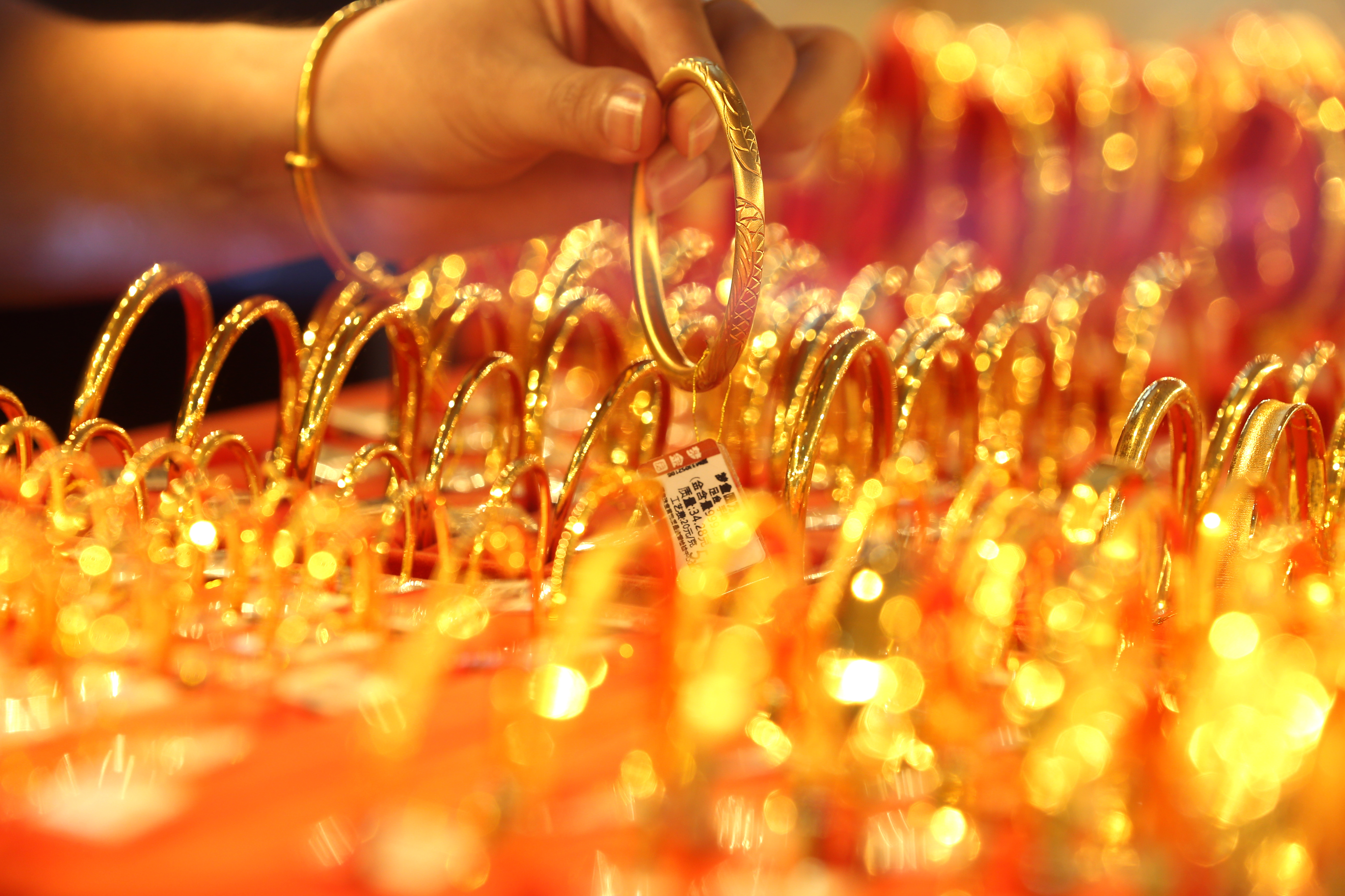Gold jewelry on display at a store on July 27, 2020 in Huzhou, Zhejiang Province of China. (Photo by Ni Lifang/VCG via Getty Images)