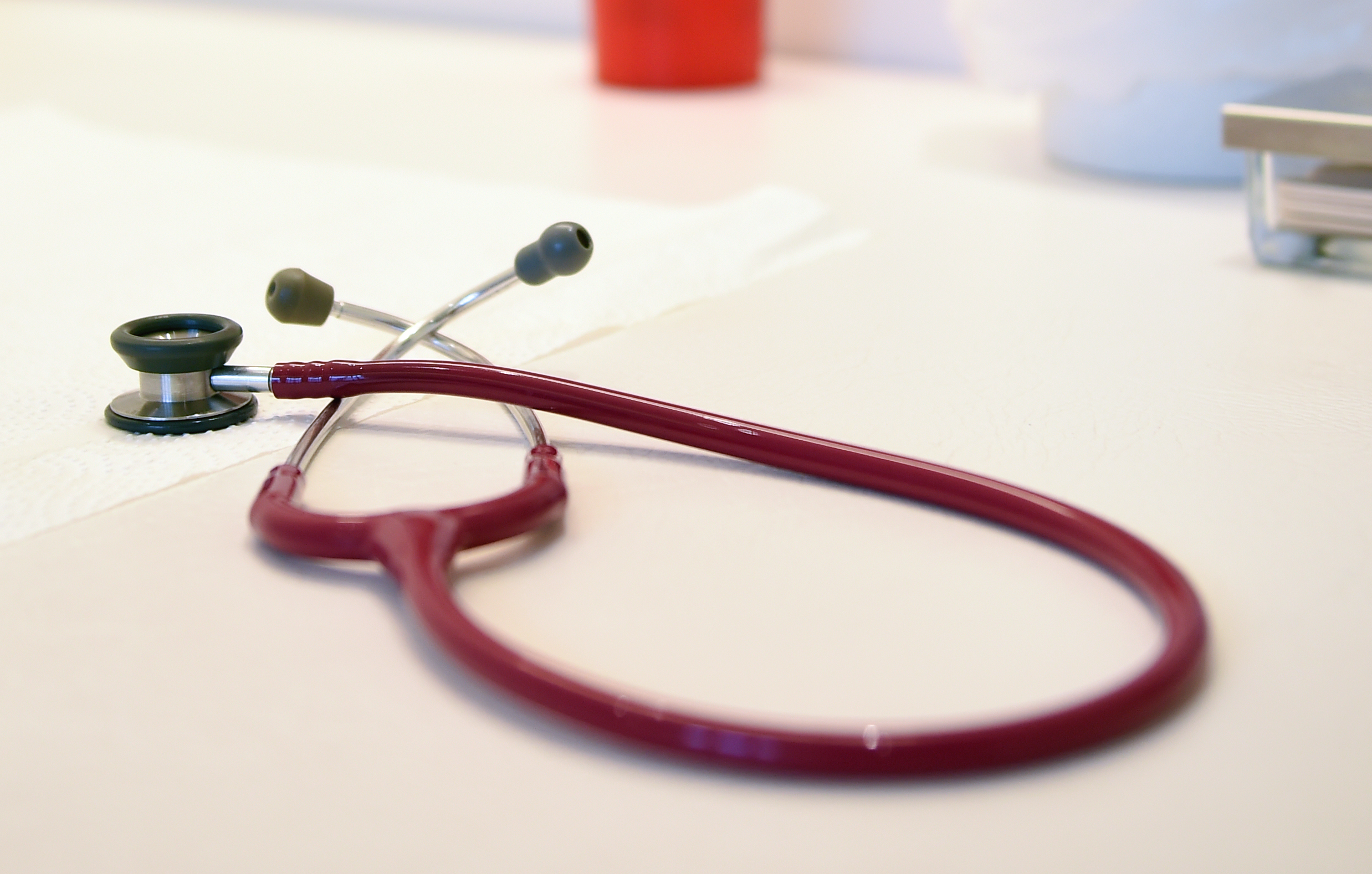 A stethoscope lies on a desk in a paediatrician surgery in Berlin Spandau, Germany, 23 August 2016. The borough of Spandau benefits from a fair dispersion of surgeries across Berlins's city region. Britta Pedersen—picture alliance/Getty Images