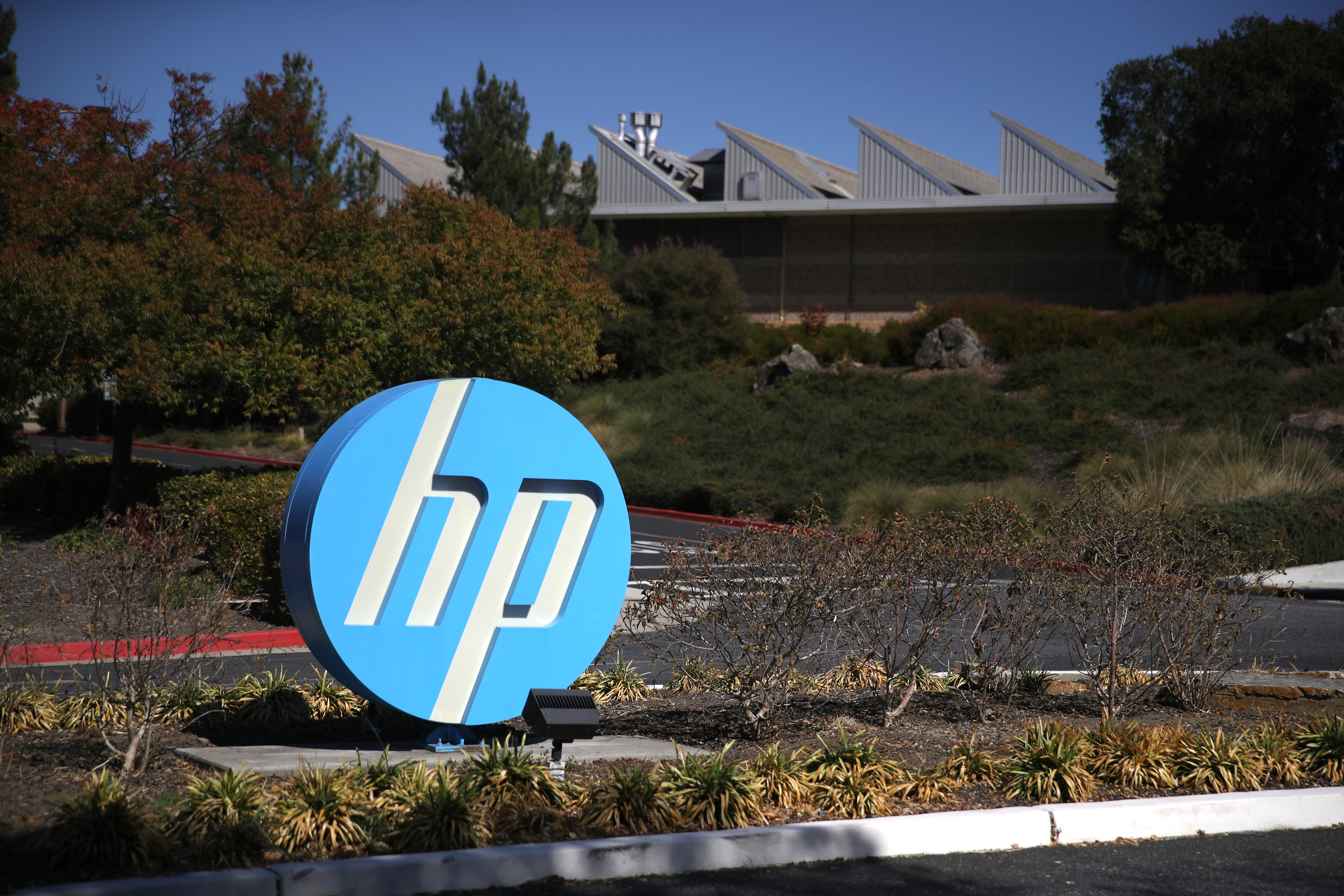 The Hewlett Packard (HP) logo is displayed in front of the office complex on October 04, 2019 in Palo Alto, California.