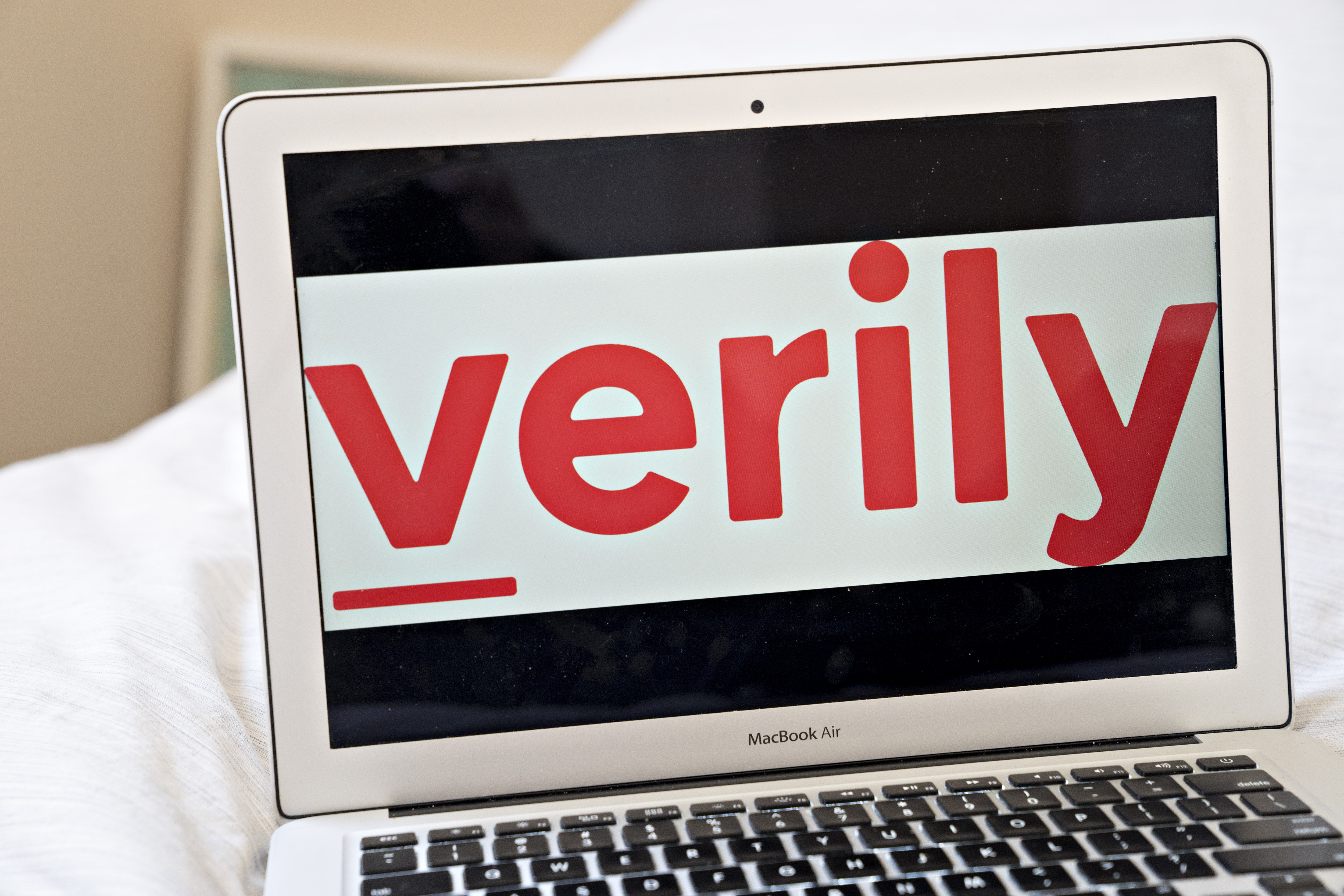 The Verily logo is displayed on a laptop computer in an arranged photograph taken in Arlington, Virginia, U.S., on Thursday, May 7, 2020. Verily, the life sciences unit owned by Alphabet Inc., has scrambled to quickly open thousands of pop-up testing sites across the country in an effort to fill gaps in the American health-care system. Photographer: Andrew Harrer/Bloomberg via Getty Images