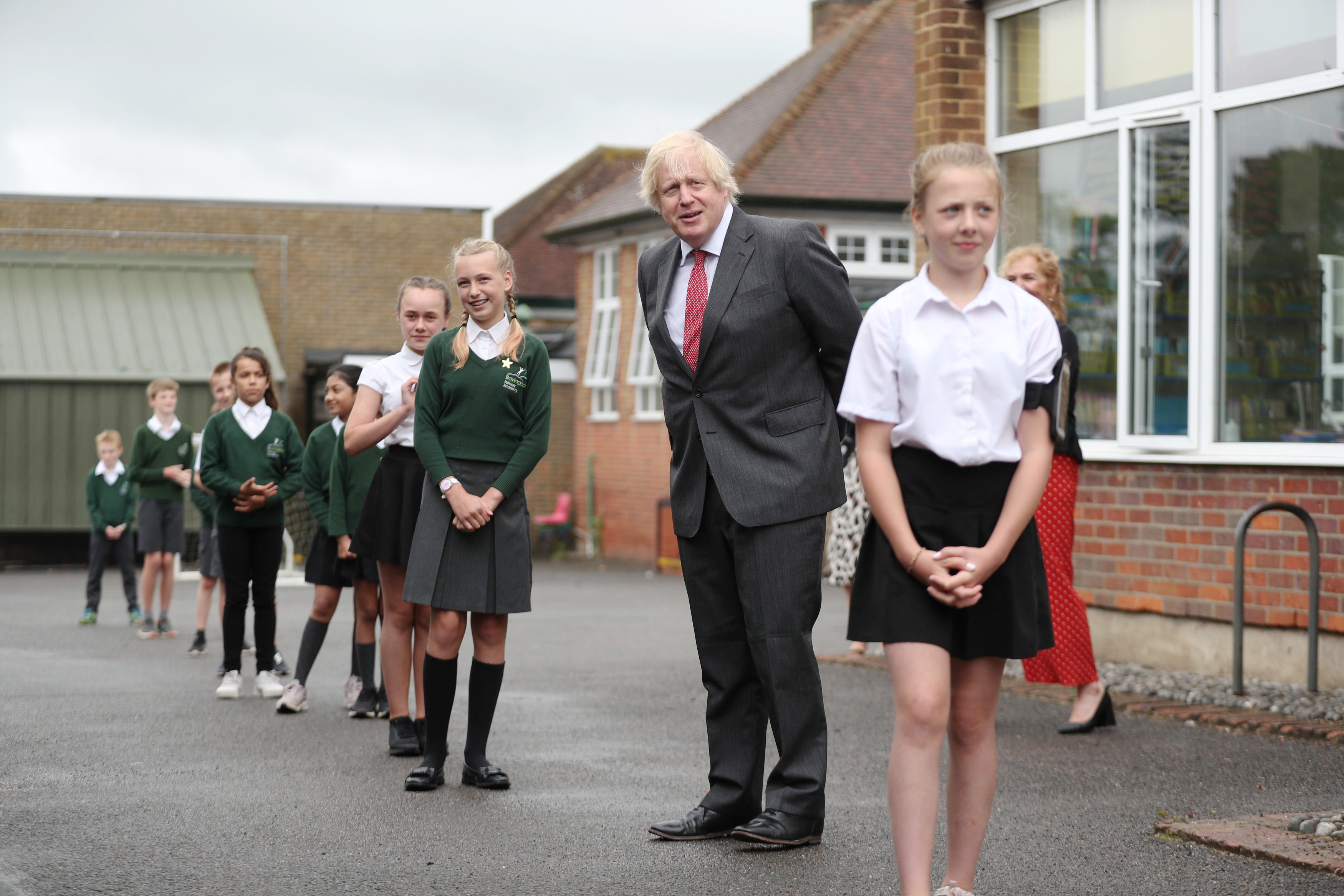 BOVINGDON, ENGLAND - JUNE 19: Prime Minister Boris Johnson joins a socially distanced lesson during a visit to Bovingdon Primary School on June 19, 2020 near Hemel Hempstead. The Government have announced a GBP 1 billion plan to help pupils catch up with their education before September after spending months out of school during the coronavirus lockdown. (Photo by Steve Parsons - WPA Pool/Getty Images)