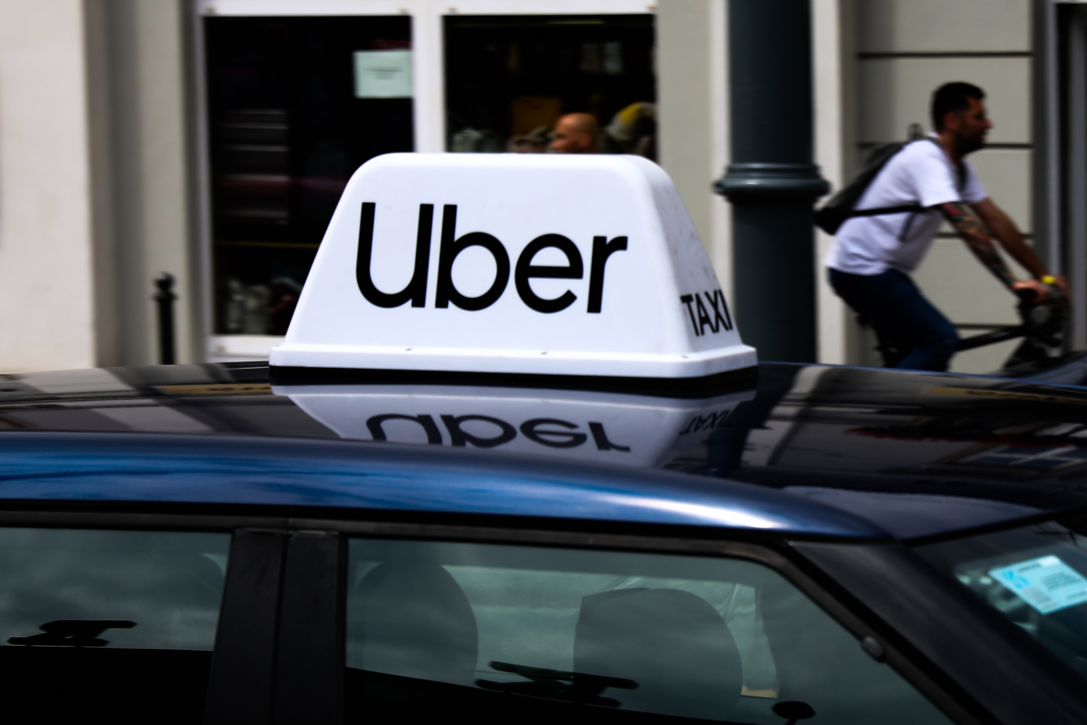 Uber sign is seen on the car in Krakow, Poland on July 17, 2020.
