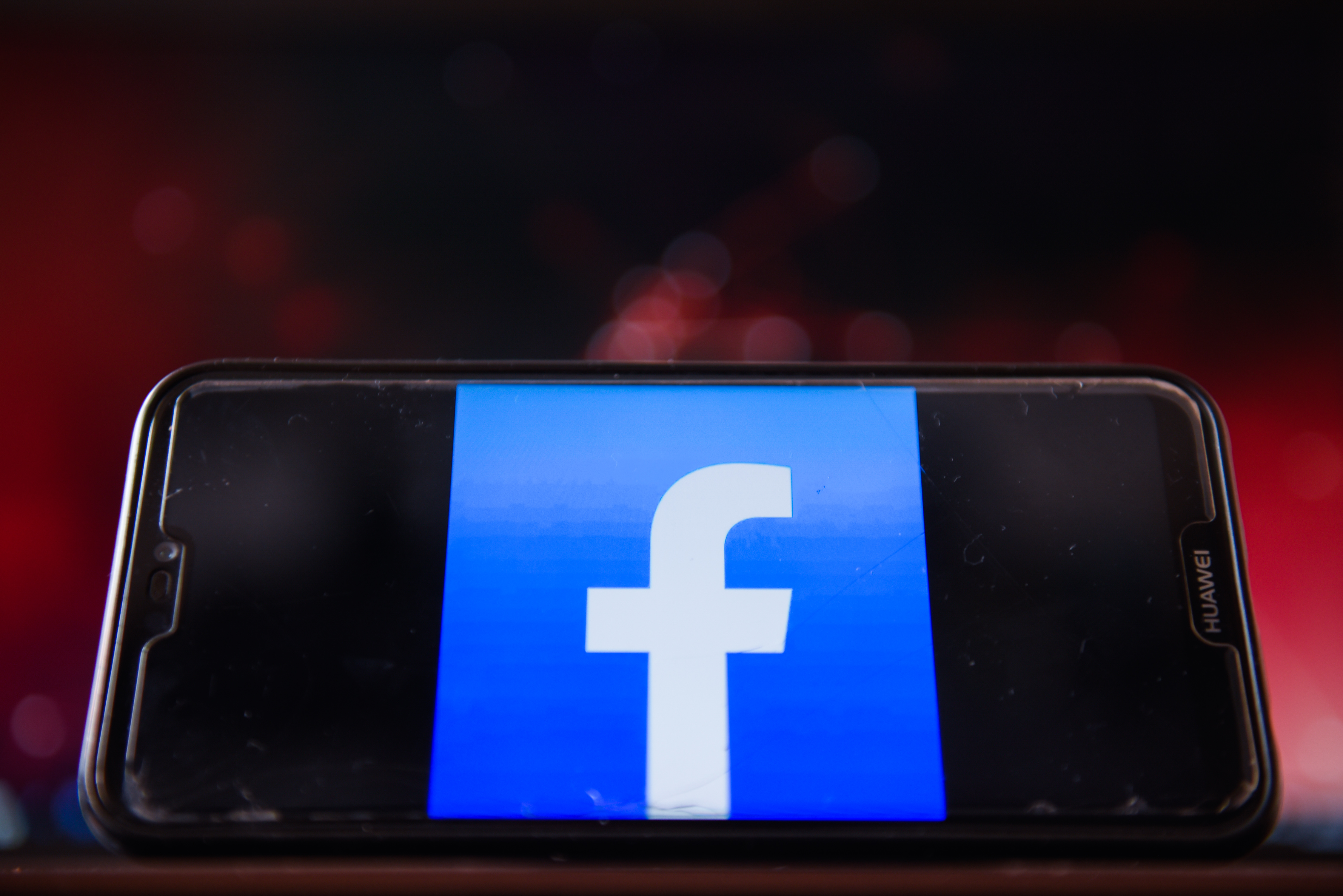 POLAND - 2020/08/04: In this photo illustration, a Facebook logo is displayed on a smartphone.