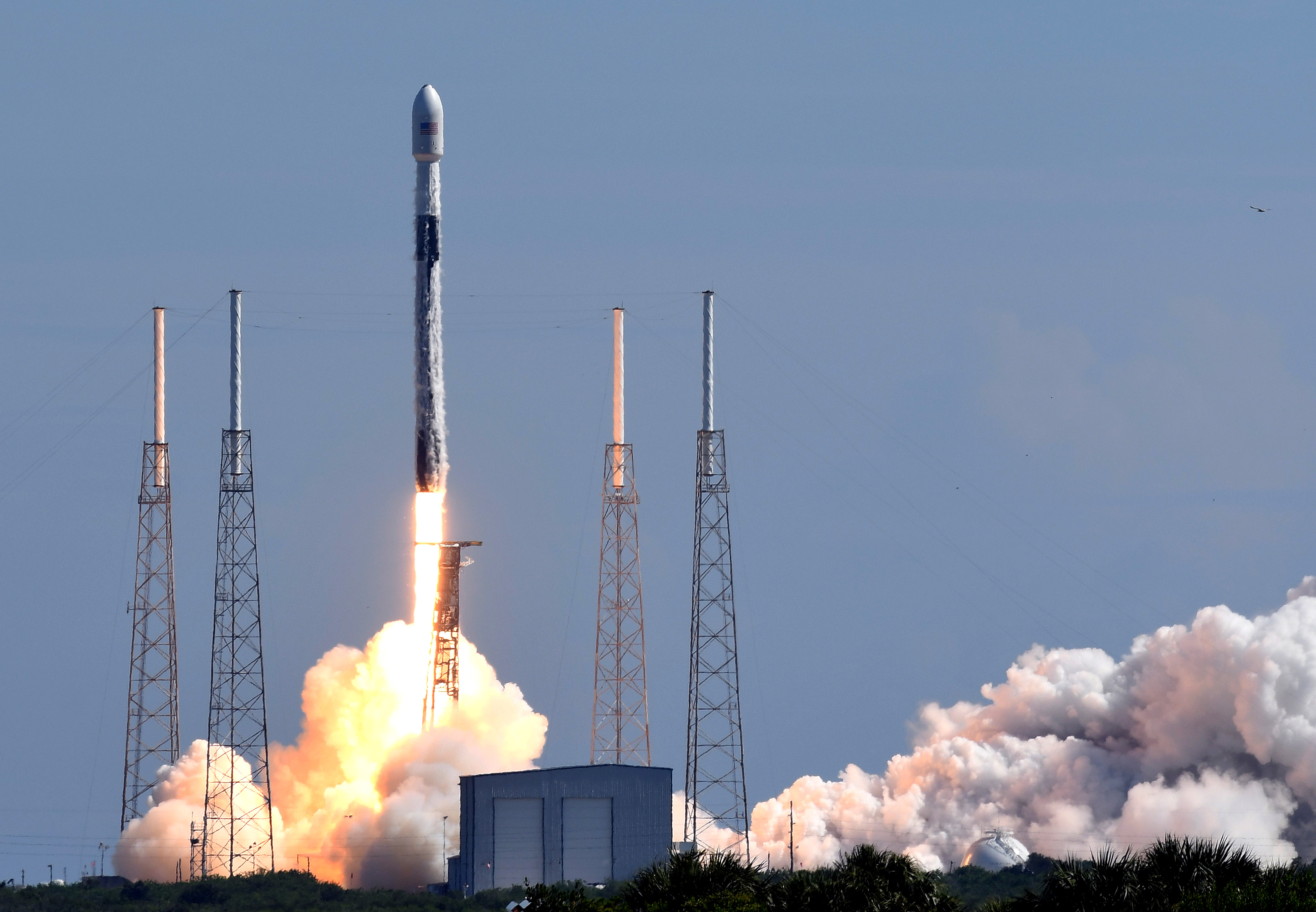 August 18, 2020 - Cape Canaveral, Florida, United States - A SpaceX Falcon 9 rocket carrying 58 satellites for SpaceX's Starlink broadband internet network and three SkySat earth-imaging satellites launches from pad 40 at Cape Canaveral Air Force Station on August 18, 2020 in Cape Canaveral, Florida.