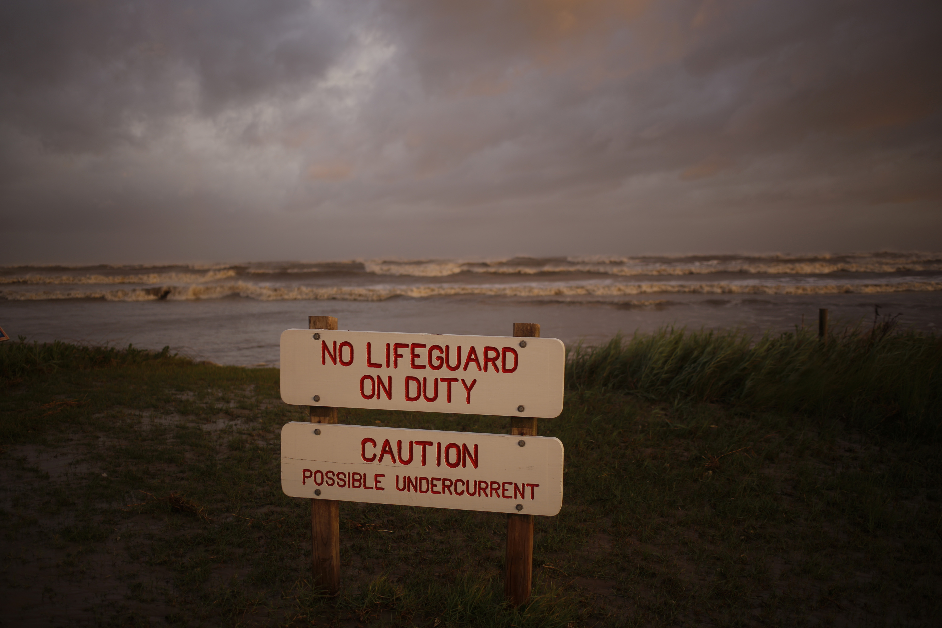 Signs are displayed at Crystal Beach ahead of Hurricane Laura in Sabine, Texas, U.S., on Wednesday, Aug. 26, 2020. Hurricane Laura is poised to become a Category 4 storm that could wreak catastrophic damage in Texas and Louisiana, bringing a life-threatening storm surge, flash flooding and destructive winds that could leave areas uninhabitable for weeks or months. Photographer: Luke Sharrett/Bloomberg via Getty Images