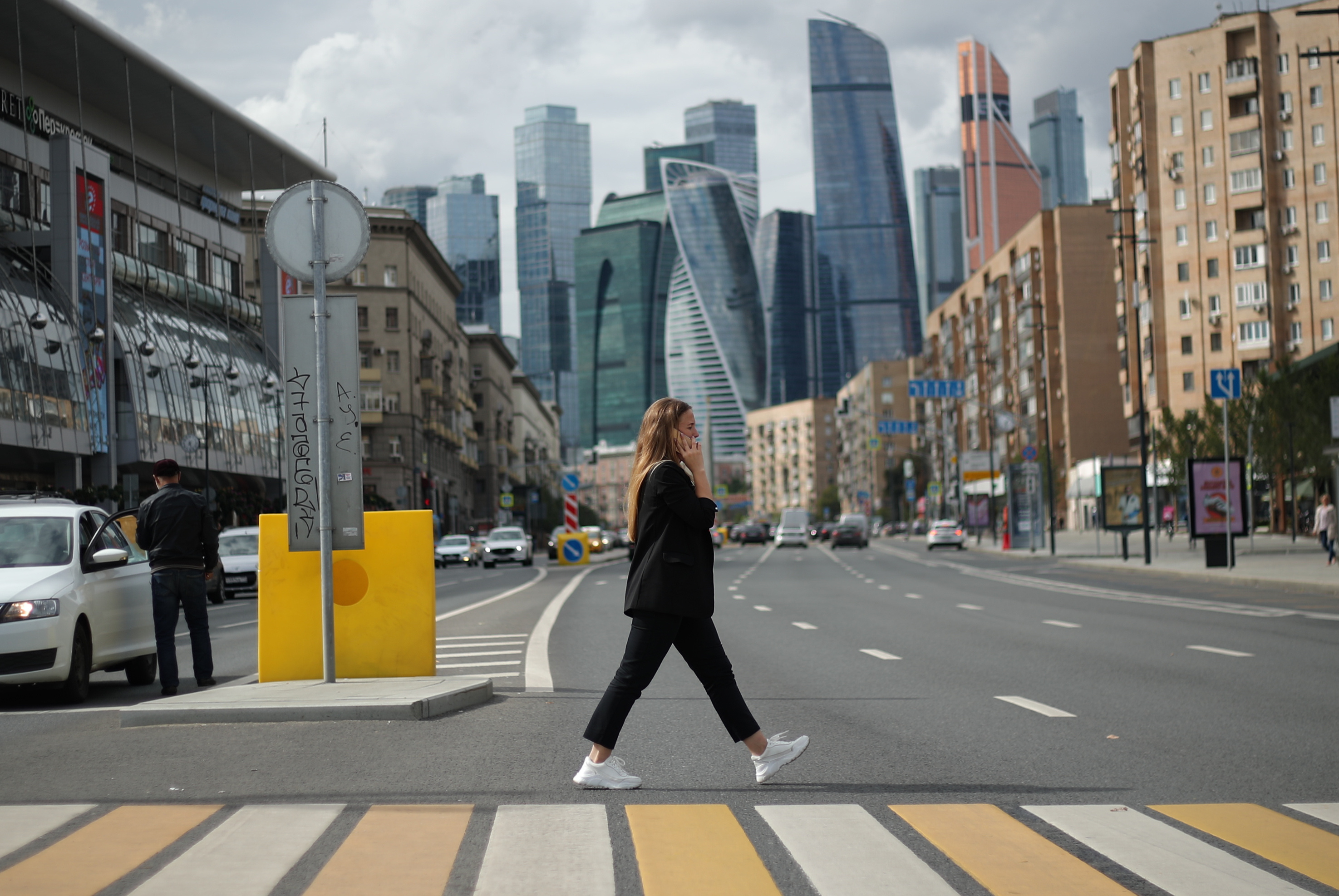 MOSCOW, RUSSIA - AUGUST 27, 2020: A girls walks on a zebra crossing in Bolshaya Dorogomilovskaya Street. Mikhail Tereshchenko/TASS (Photo by Mikhail TereshchenkoTASS via Getty Images)