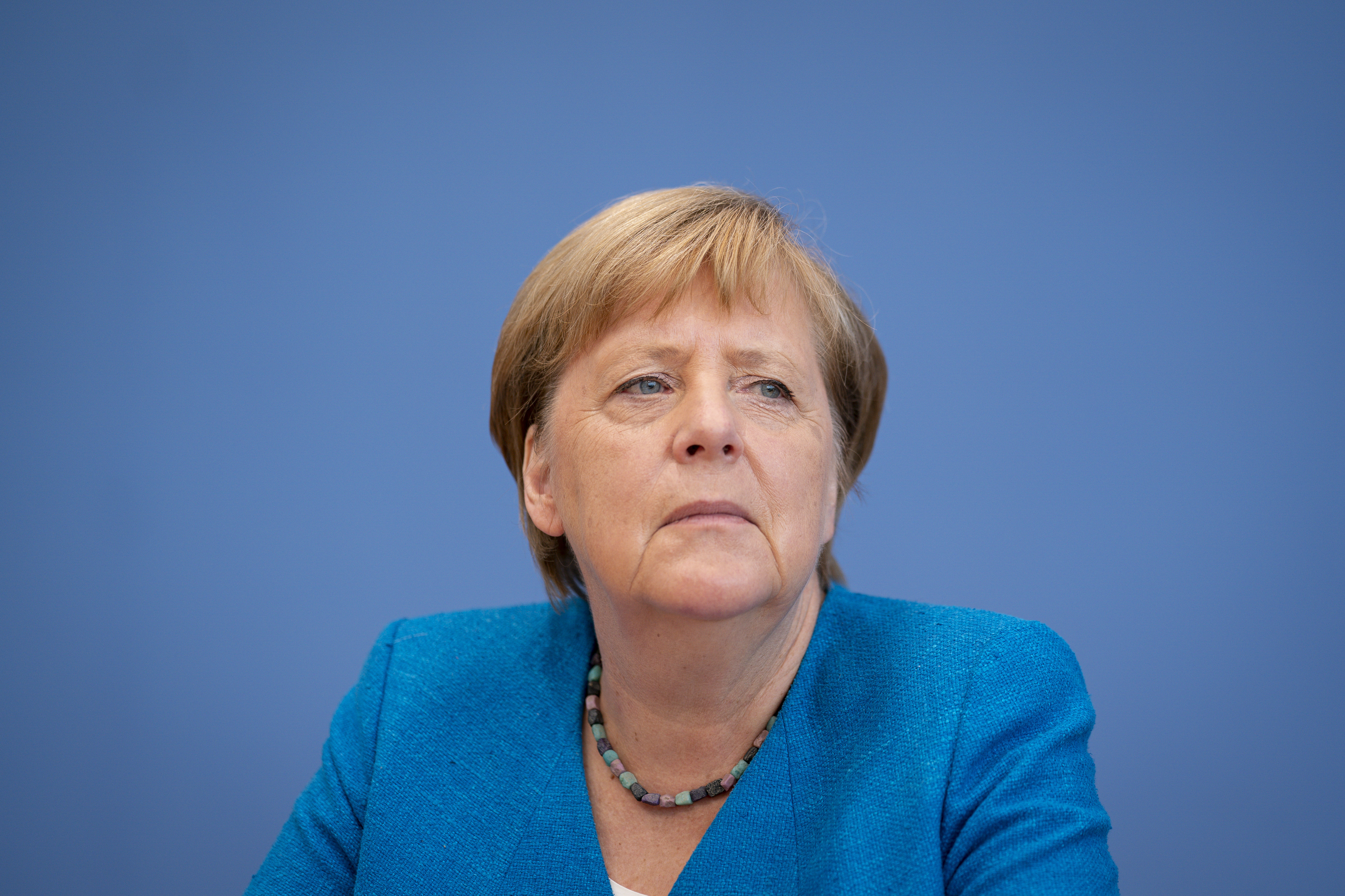 BERLIN, GERMANY - AUGUST 28: German Chancellor Angela Merkel speaks to the media at her annual summer press conference during the coronavirus pandemic on August 28, 2020 in Berlin, Germany. Merkel is likely to speak on a range of issues, including the pandemic and the economy. (Photo by Henning Schacht - Pool/ Getty Images)