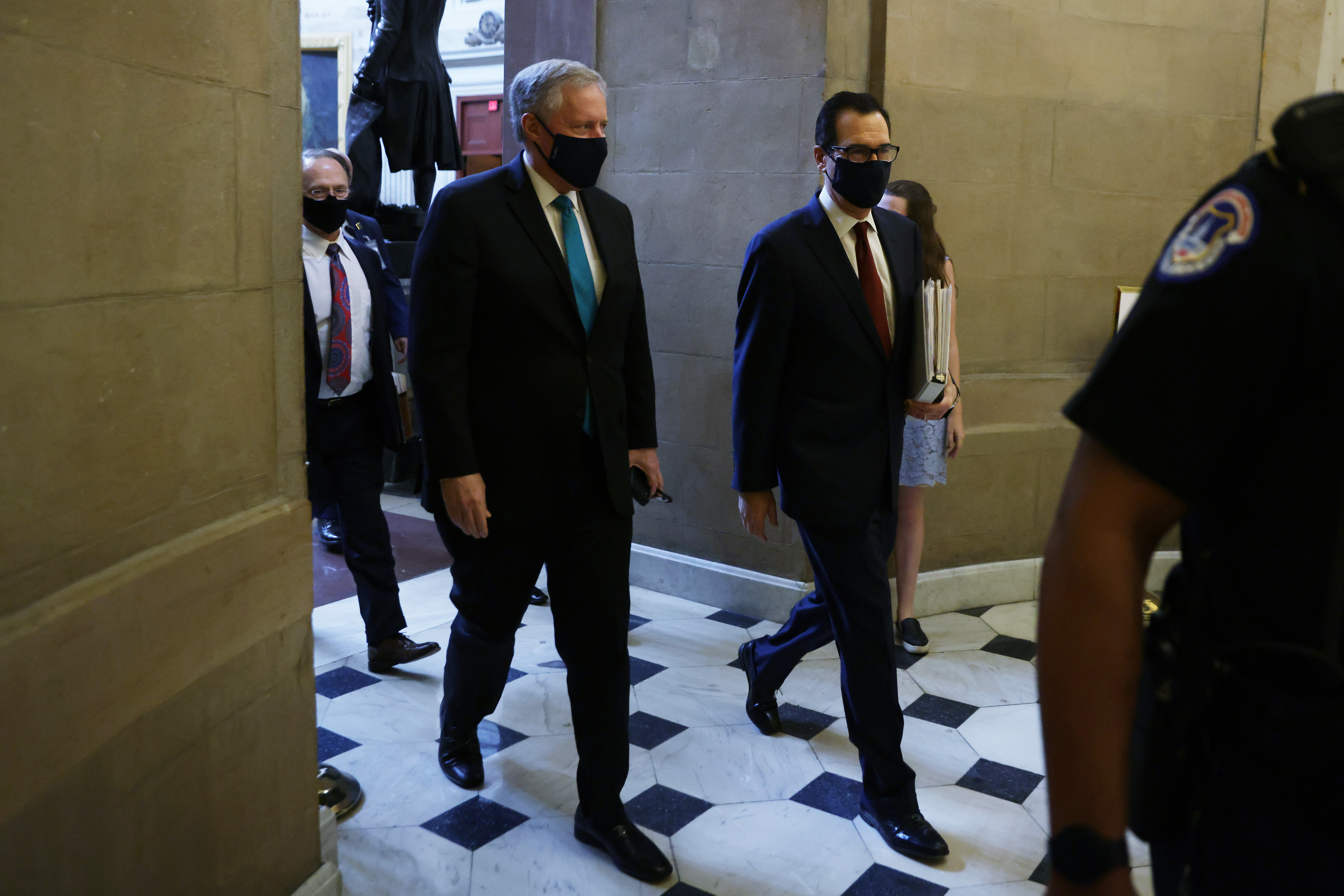 WASHINGTON, DC - AUGUST 05:  White House Chief of Staff Mark Meadows and U.S. Treasury Secretary Steven Mnuchin arrive at a meeting at the office of Speaker of the House Rep. Nancy Pelosi (D-CA) at the U.S. Capitol August 5, 2020 in Washington, DC.  Alex Wong/Getty Images