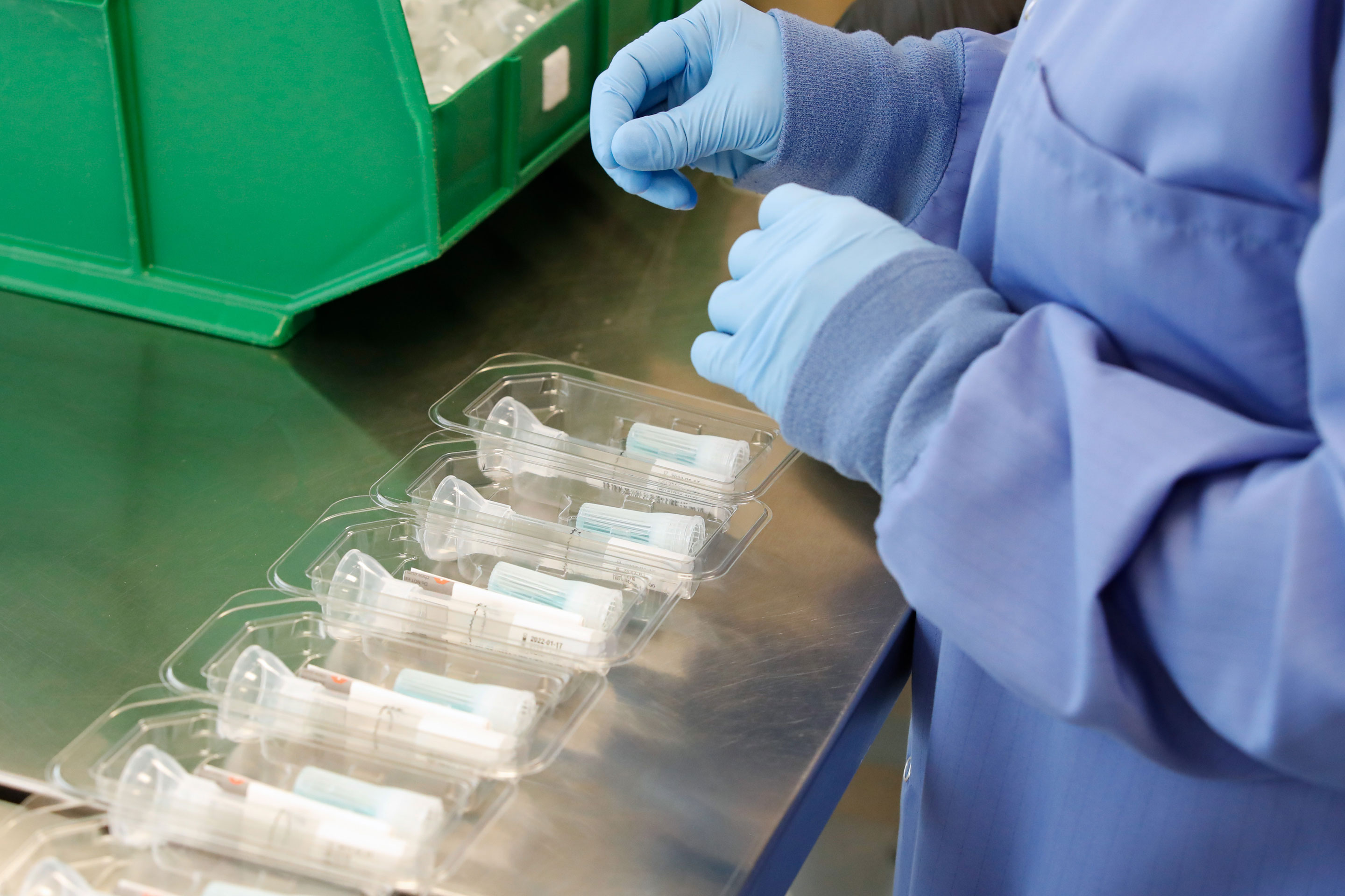 FDA Clears First Saliva Test To Diagnose Coronavirus
A worker assembles Covid-19 saliva test kits at Spectrum Solutions headquarters in Draper, Utah, U.S., on Monday, April 20, 2020. Spectrum DNA has developed a test kit to detect the coronavirus in patients' saliva. Photographer: George Frey/Bloomberg via Getty Images