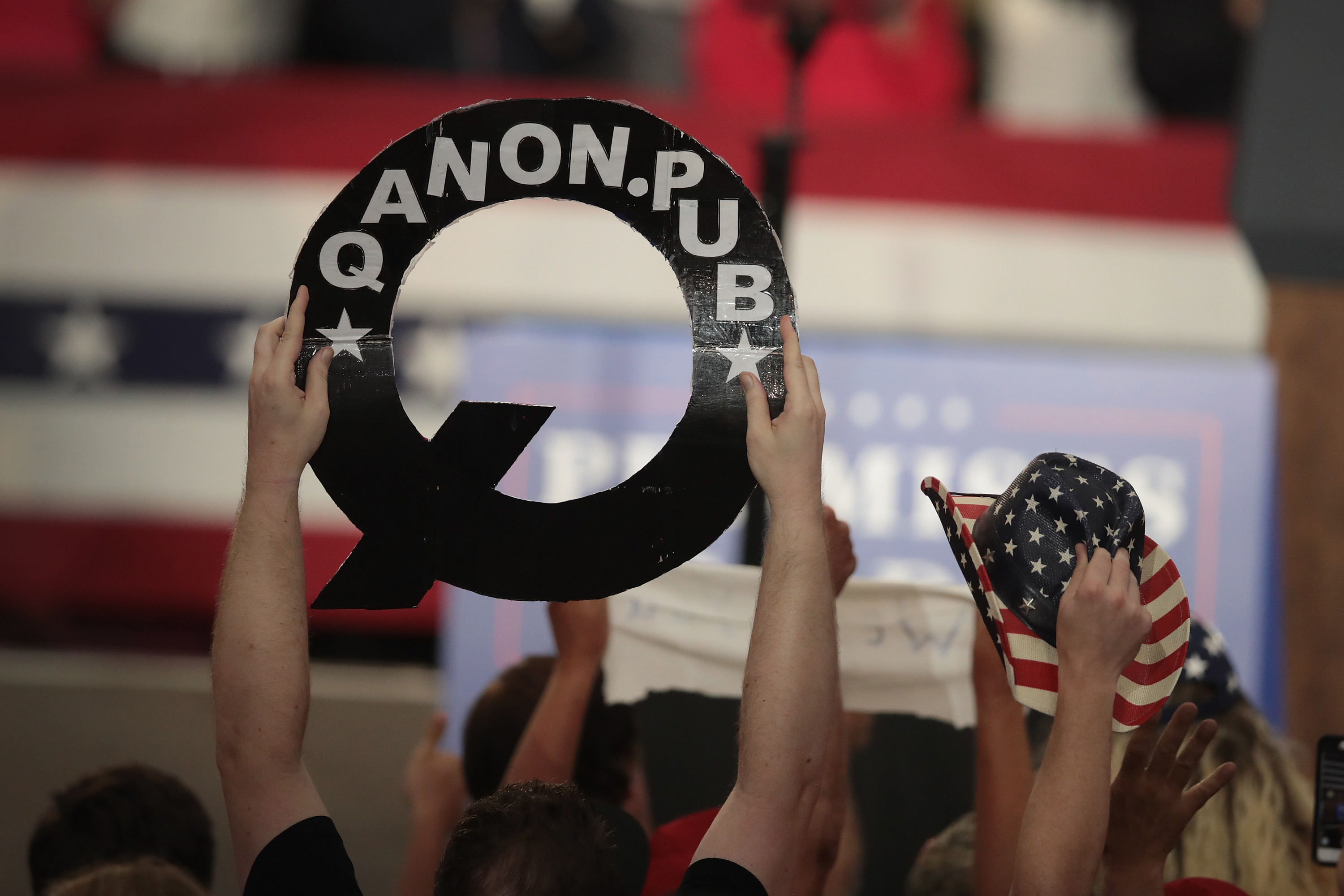 Guests cheer for President Donald Trump as he speaks at a rally to show support for Ohio Republican congressional candidate Troy Balderson on August 4, 2018 in Lewis Center, Ohio. Balderson faces Democratic challenger Danny O'Connor for Ohio's 12th Congressional District on Tuesday. (Photo by Scott Olson/Getty Images)