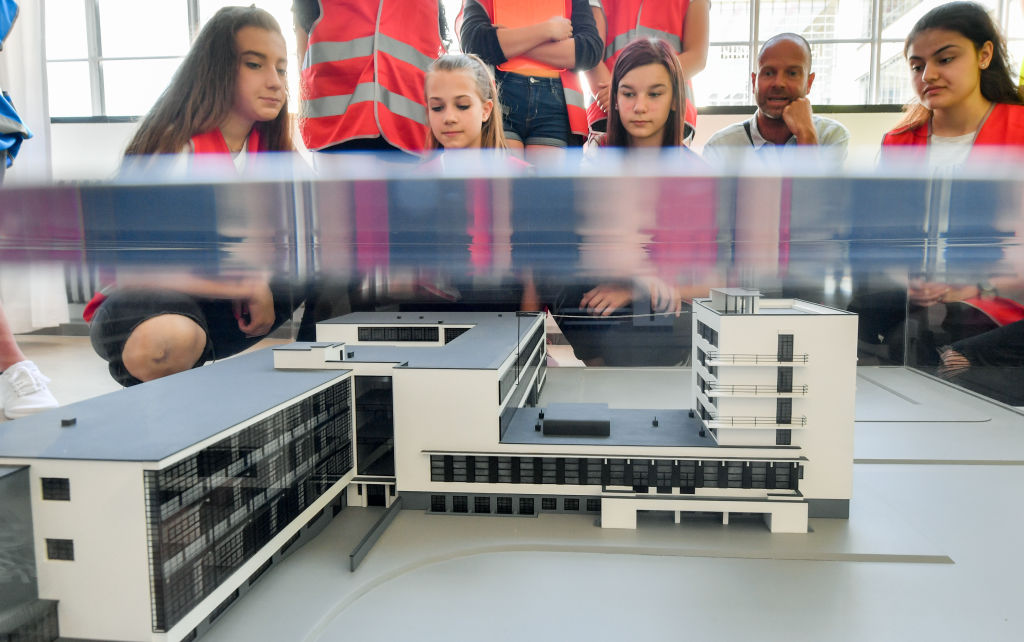 A model of the bauhaus building in Dassau, designed by Walter Gropius, the founder of the movement. Photo by Hendrik Schmidt/picture alliance via Getty Images