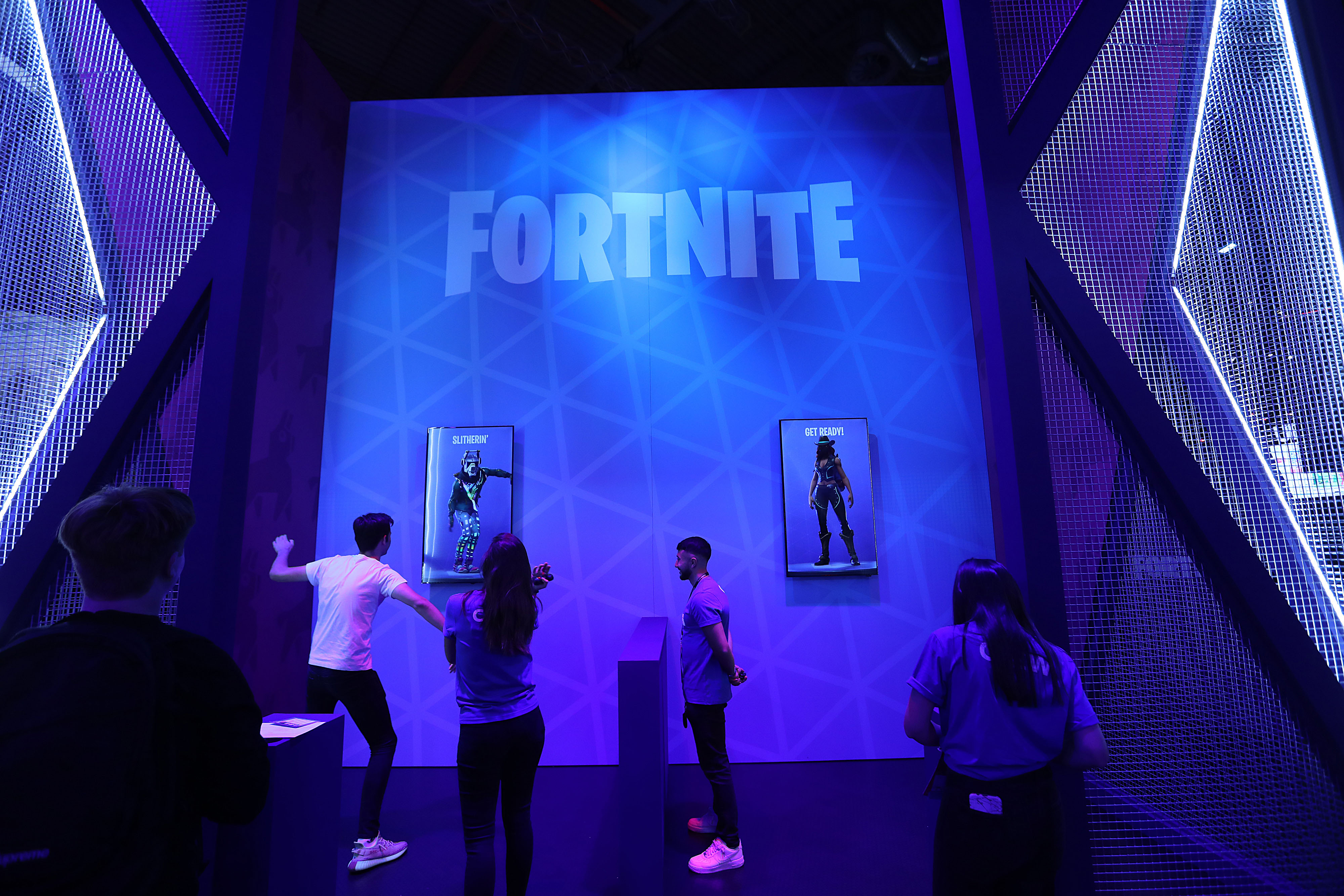 An attendee performs a 'floss' dance on the Epic Games Inc. Fortnite video game stand at the Gamescom gaming industry event in Cologne, Germany, on Tuesday, Aug. 20, 2019. Gamescom is the world's largest gaming convention and runs from August 20 to 24. Photographer: Krisztian Bocsi/Bloomberg via Getty Images