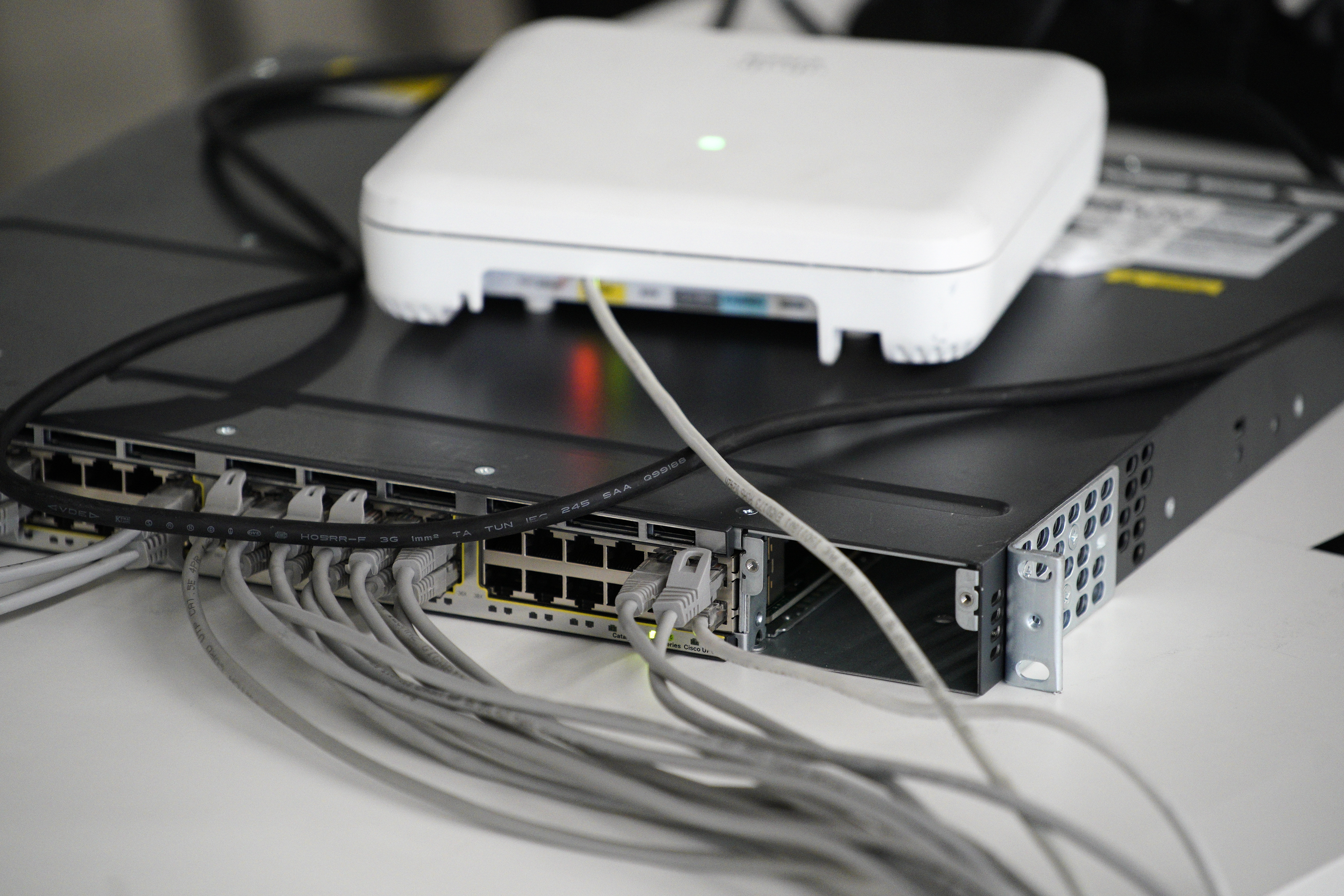 Routers with network cables are seen during the Hackyeah hackathon in Warsaw, Poland on September 18, 2019. The Hackyeah hackathon is the largest stationary hackathon in Europe with around 2500 participants taking part in an overnight hacking compeition and over 100 thousand Euros in prize money. Jaap Arriens—NurPhoto/Getty Images