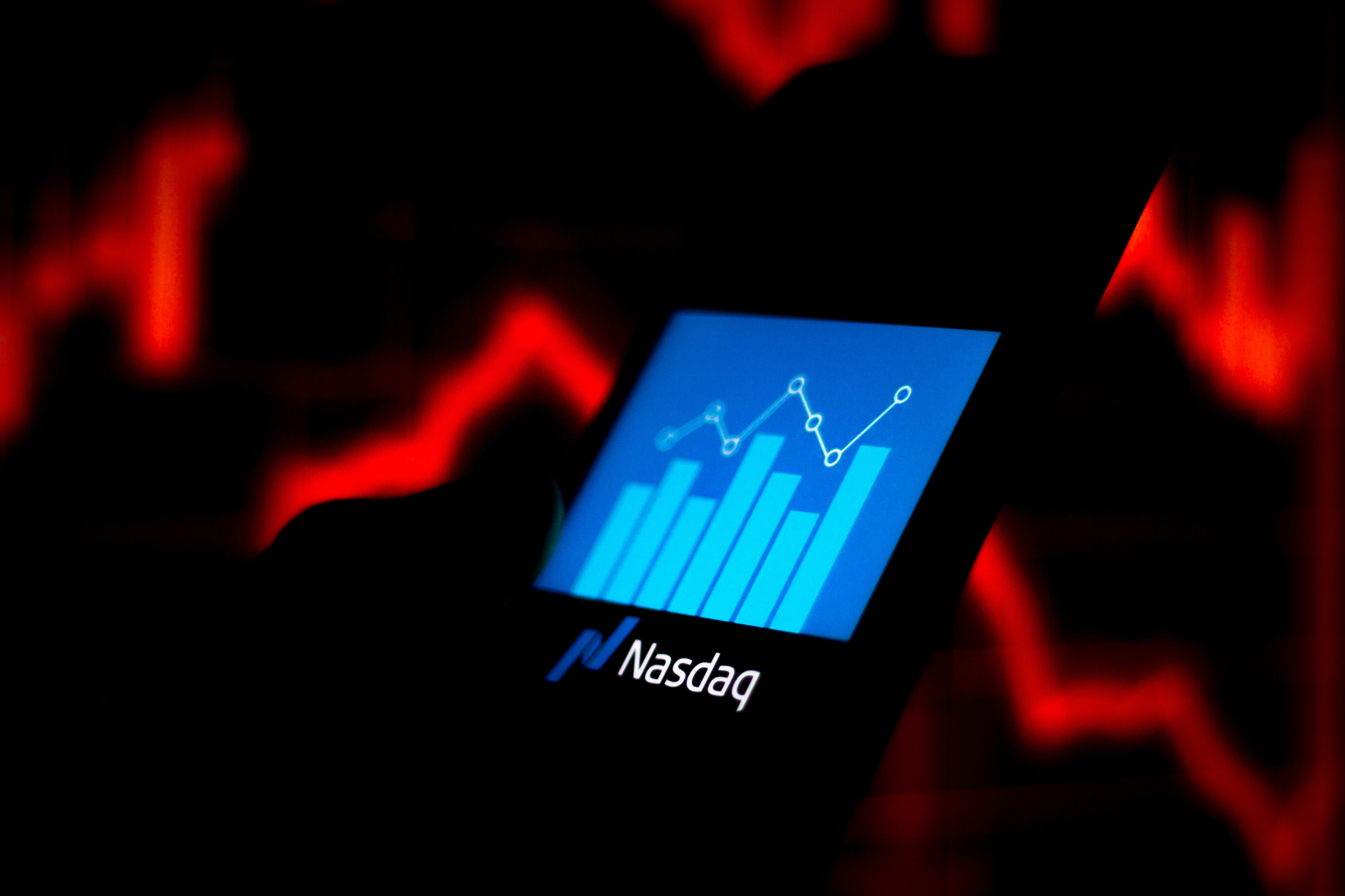 A Nasdaq Composite logo seen displayed on a smartphone.