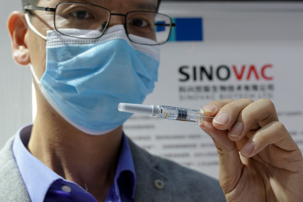 A booth displaying China's Sinovac Biotech Ltd. shows a COVID-19 vaccine candidate during the 2020 China International Fair for Trade in Services (CIFTIS) at Beijing Olympic Park on September 5, 2020 in Beijing, China.  (Photo by Lintao Zhang/Getty Images)