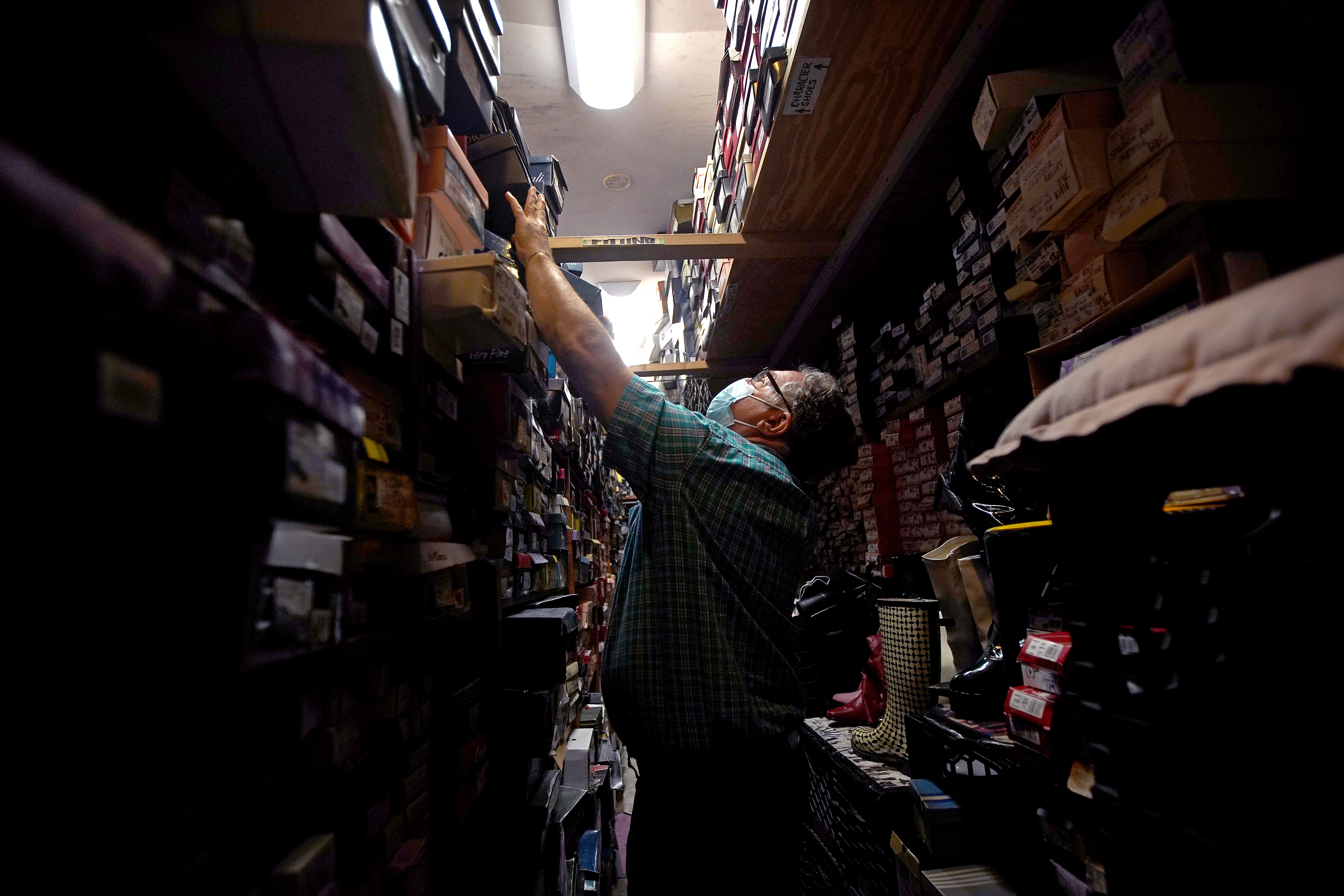 The stockroom at Teddy Shoes in Central Square in Cambridge, Mass. Without major changes in response to COVID-19, the author writes, “we risk losing our independent businesses for good.”