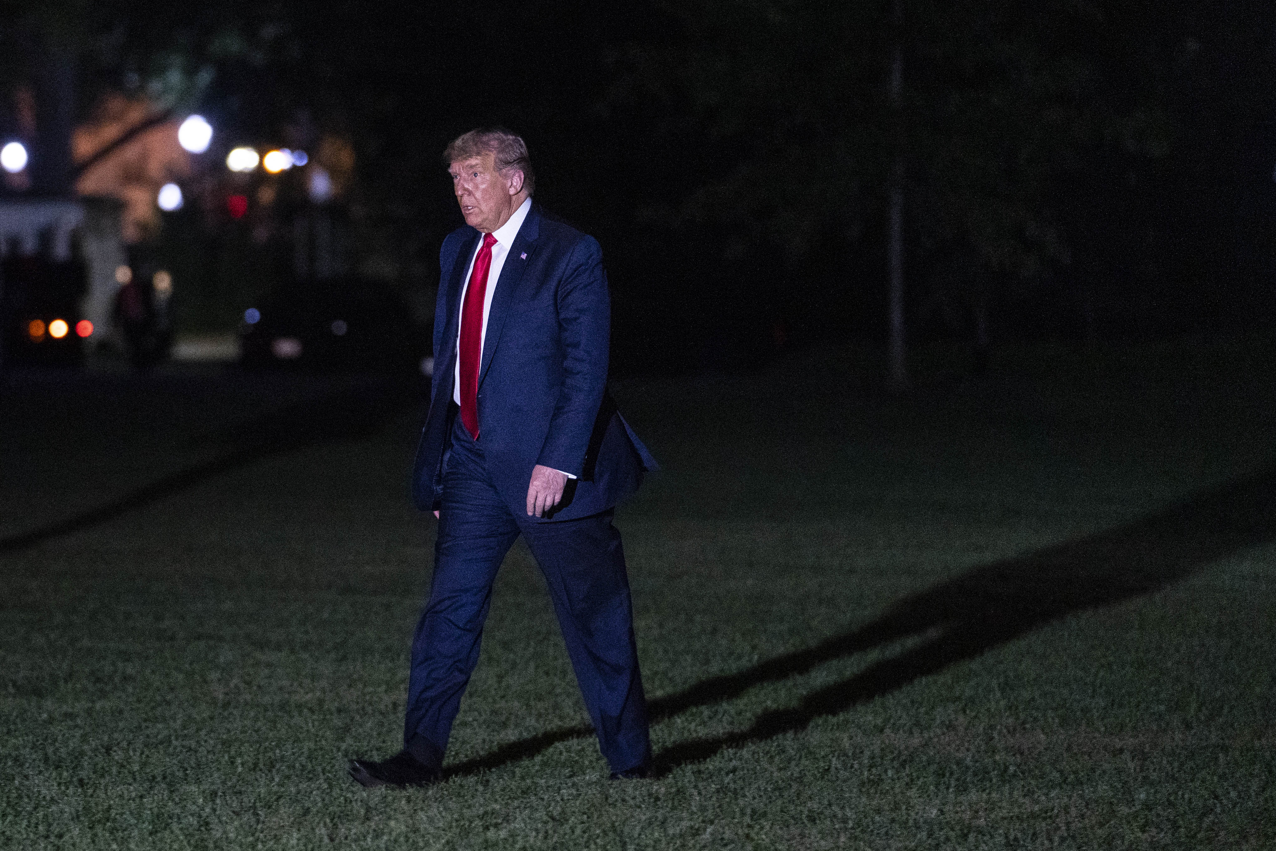 WASHINGTON, DC - SEPTEMBER 19: U.S. President Donald Trump walks along the South Lawn to the White House on September 19, 2020 in Washington, DC. President Trump is traveled to North Carolina for a campaign rally. (Photo by Sarah Silbiger/Getty Images)