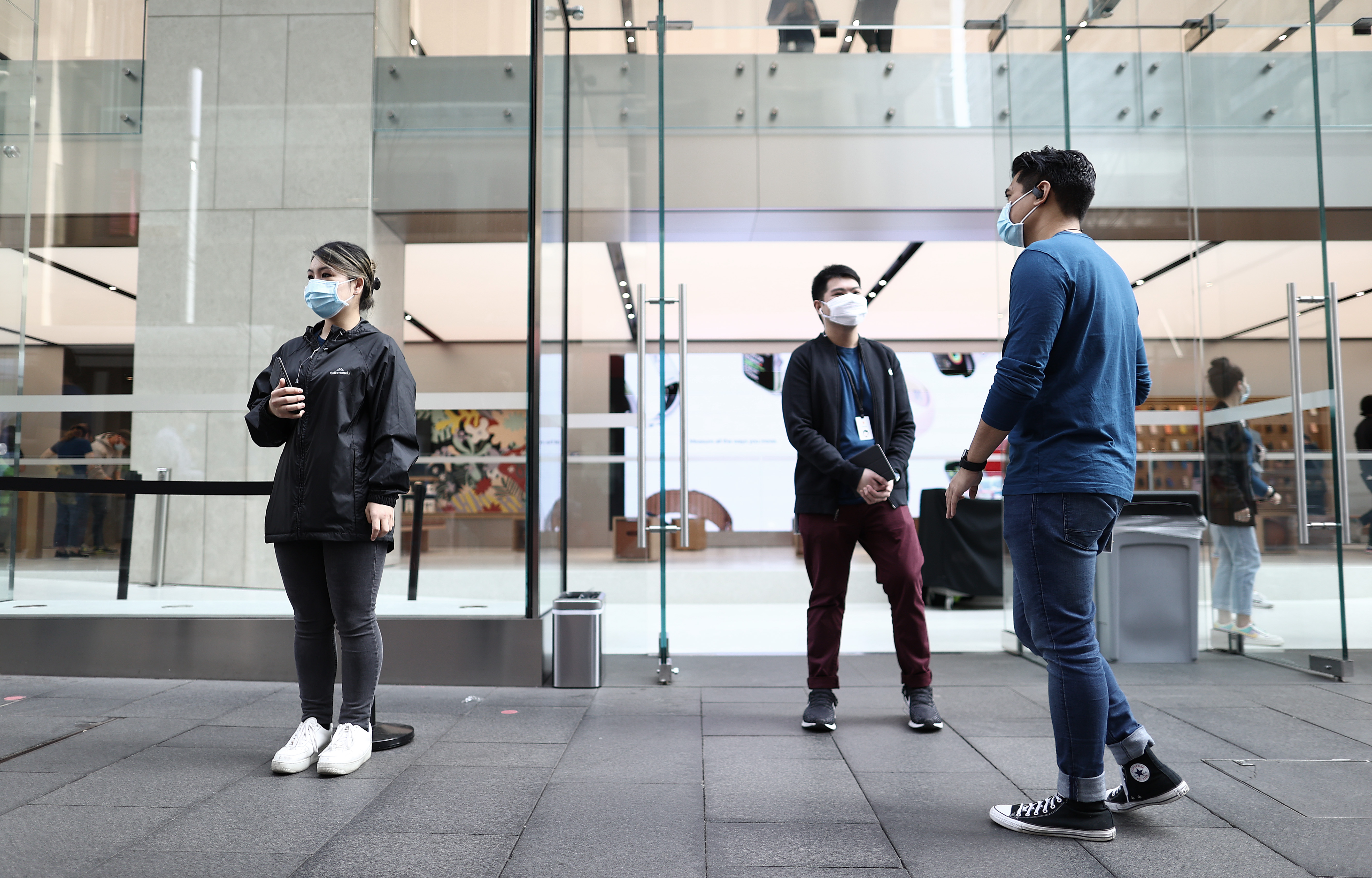 SYDNEY, AUSTRALIA - SEPTEMBER 02: Apple Store staff and customers are seen wearing face masks in Sydney CBD on September 02, 2020 in Sydney, Australia. Seventeen new cases of COVID-19 were diagnosed in NSW in the past 24 hours. One case is in hotel quarantine, 15 are linked to known clusters and one case is locally acquired with no known source. Ryan Pierse—Getty Images
