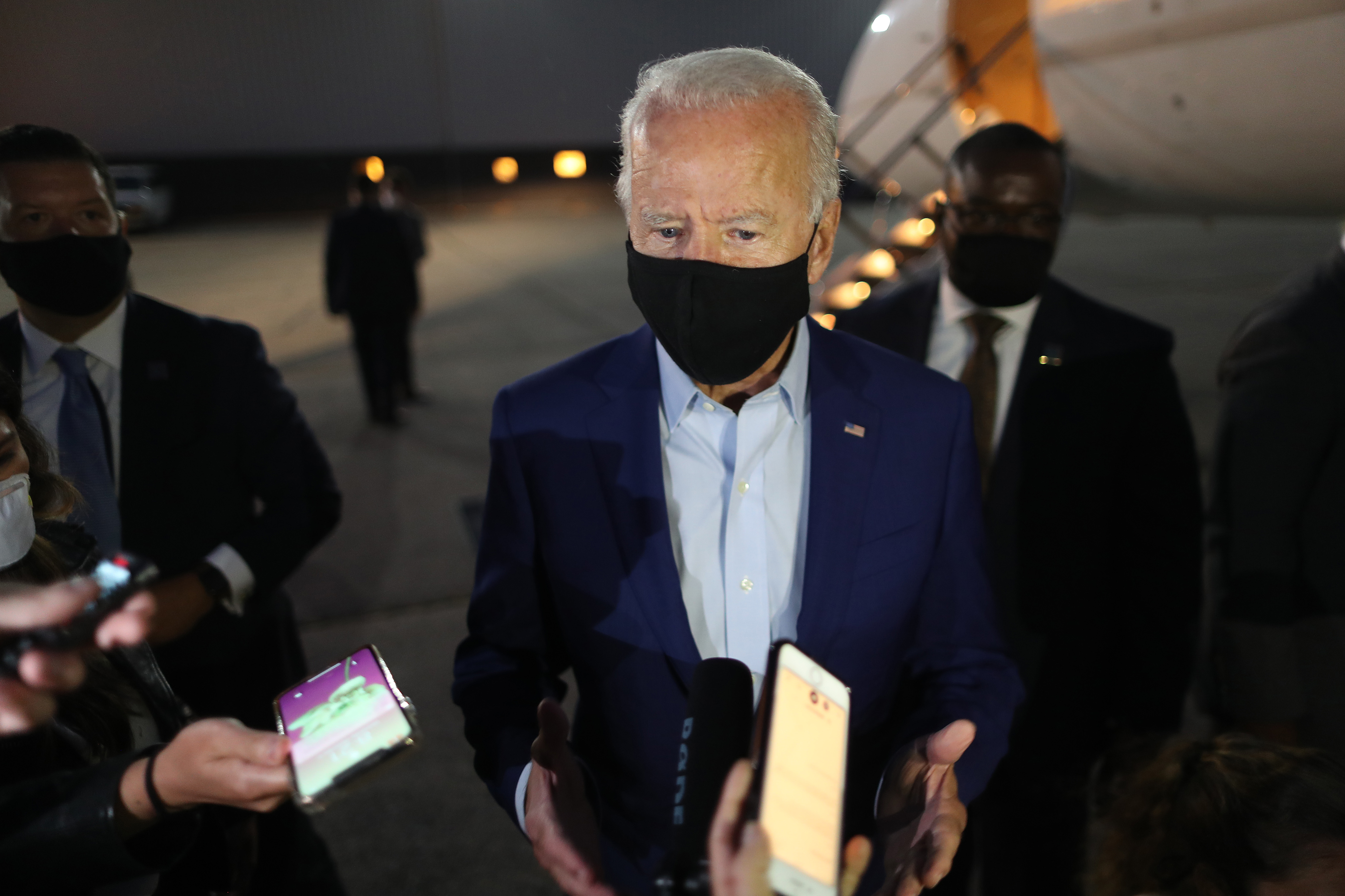 ROMULUS, MICHIGAN - SEPTEMBER 09: Democratic presidential nominee Joe Biden talks with journalists before departing the Detroit Metro area September 09, 2020 in Romulus, Michigan. Biden was campaigning in Michigan, which President Donald Trump won in 2016 by less than 11,000 votes, the narrowest margin of victory in state's presidential election history. Chip Somodevilla—Getty Images