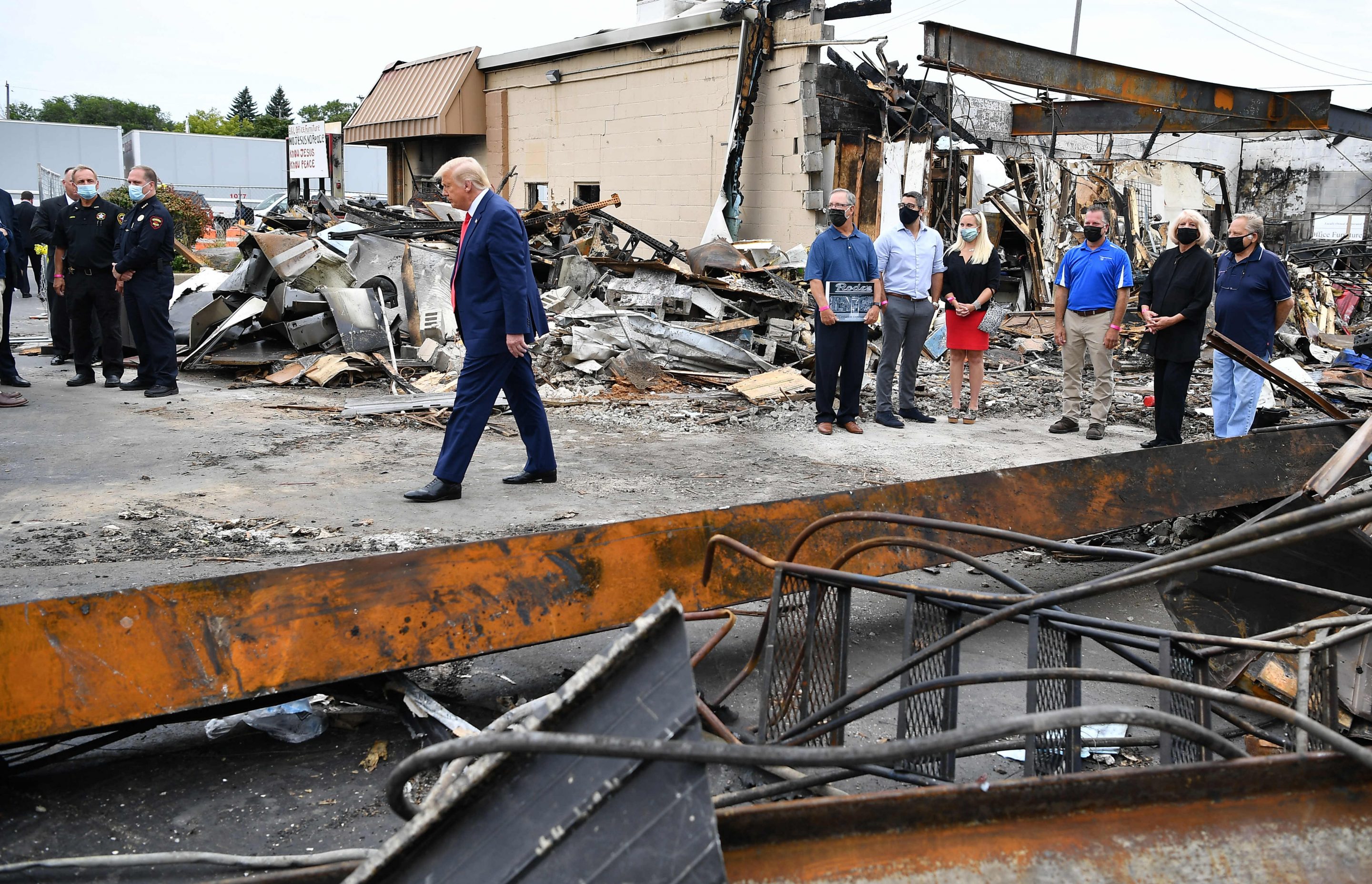 US President Donald Trump tours an area affected by civil unrest in Kenosha, Wisconsin on September 1, 2020. Trump visited Kenosha, the city at the center of a raging U.S. debate over racism, despite pleas to stay away and claims he is dangerously fanning tensions as a reelection ploy.