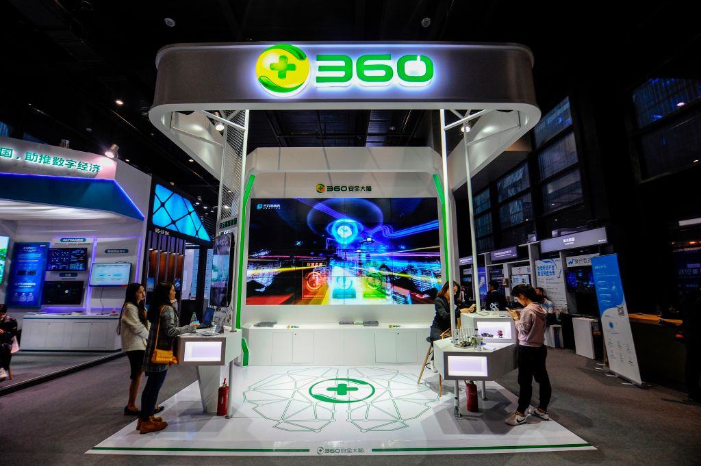 People visiting a booth of Qihoo 360 at the Light of Internet Expo ahead of the 5th World Internet Conference in Wuzhen in China's eastern Zhejiang province on November 6, 2018. STR/AFP via Getty Images