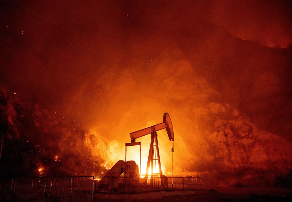 Despite climate pledges made by many major oil giants, none of them are yet on track to match the Paris Agreement target. Photo by JOSH EDELSON/AFP via Getty Images