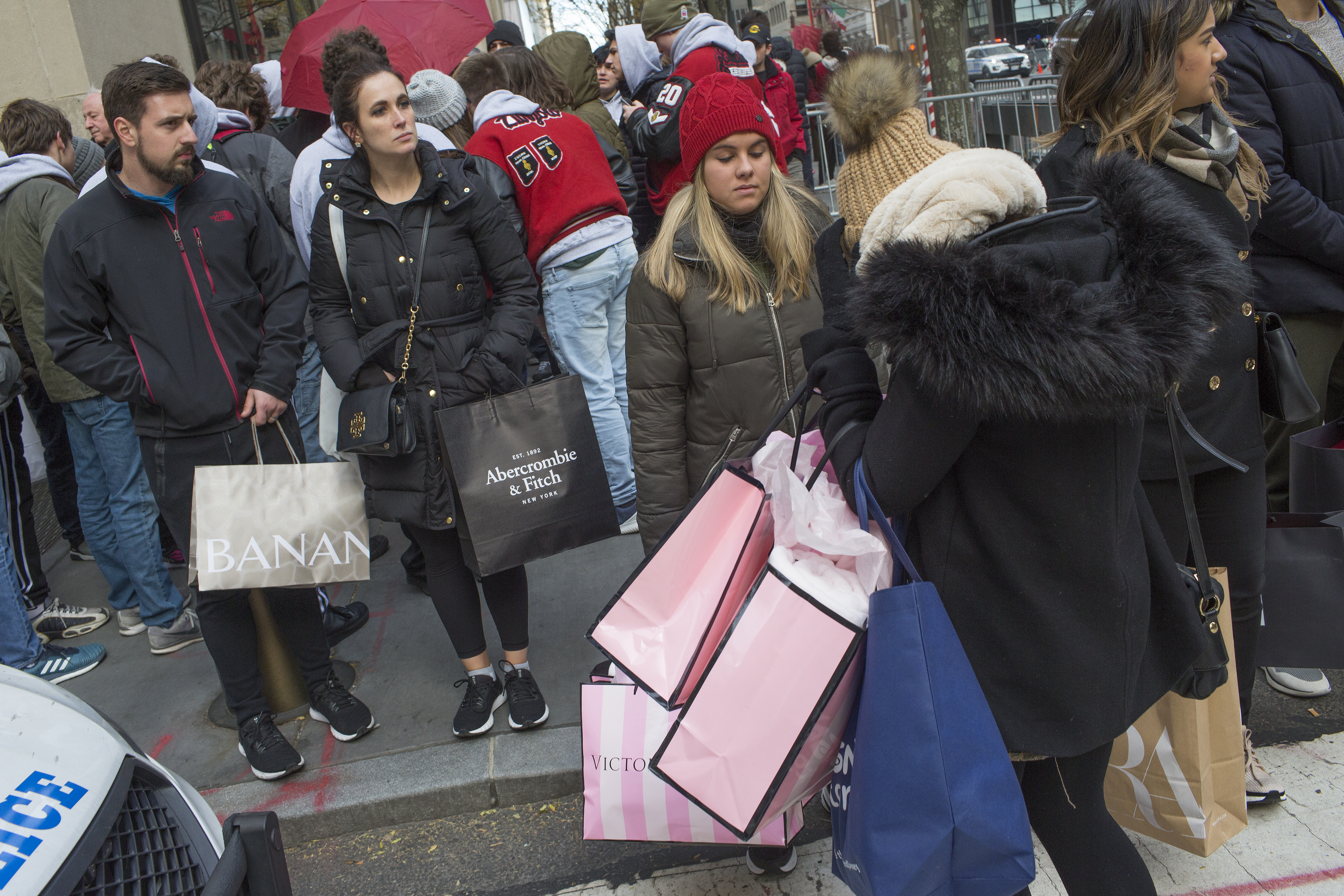 NEW YORK, NEW YORK - NOVEMBER 29: Tourists and shoppers from around the world crowd the flagship sores along 5th Avenue on Black Friday on November 29, 2019 in midtown Manhattan, New York City. Black Friday, the day after Thanksgiving, is traditionally the start of the Christmas shopping season that stores promote with discount sales. (Photo by Andrew Lichtenstein/Corbis via Getty Images)