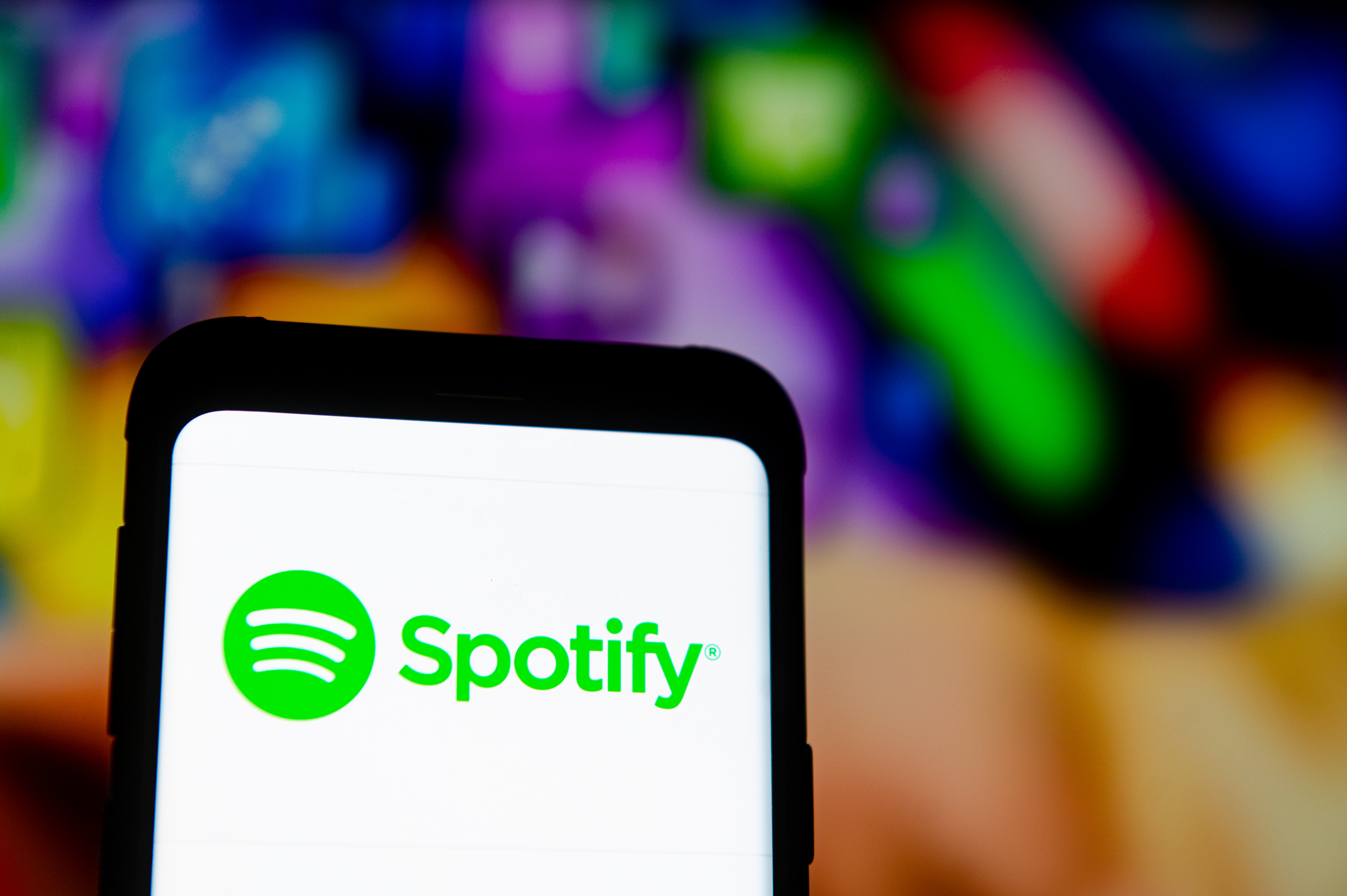 POLAND - 2020/03/23: In this photo illustration a Spotify logo seen displayed on a smartphone.