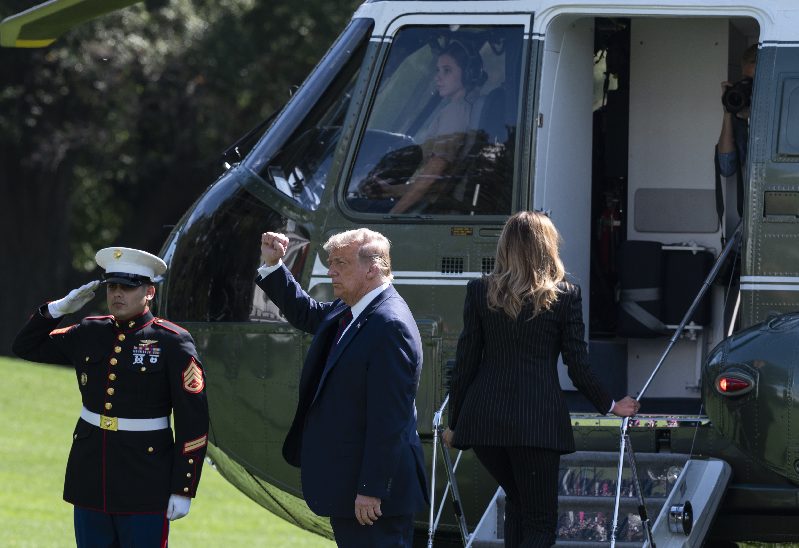 US President Donald Trump and First Lady Melania Trump walk to Marine One to depart from the South Lawn of the White House in Washington, DC on September 29, 2020. - US President Trump is flying to North Carolina to participate in the first presidential debate. (Photo by ANDREW CABALLERO-REYNOLDS / AFP) (Photo by ANDREW CABALLERO-REYNOLDS/AFP via Getty Images)