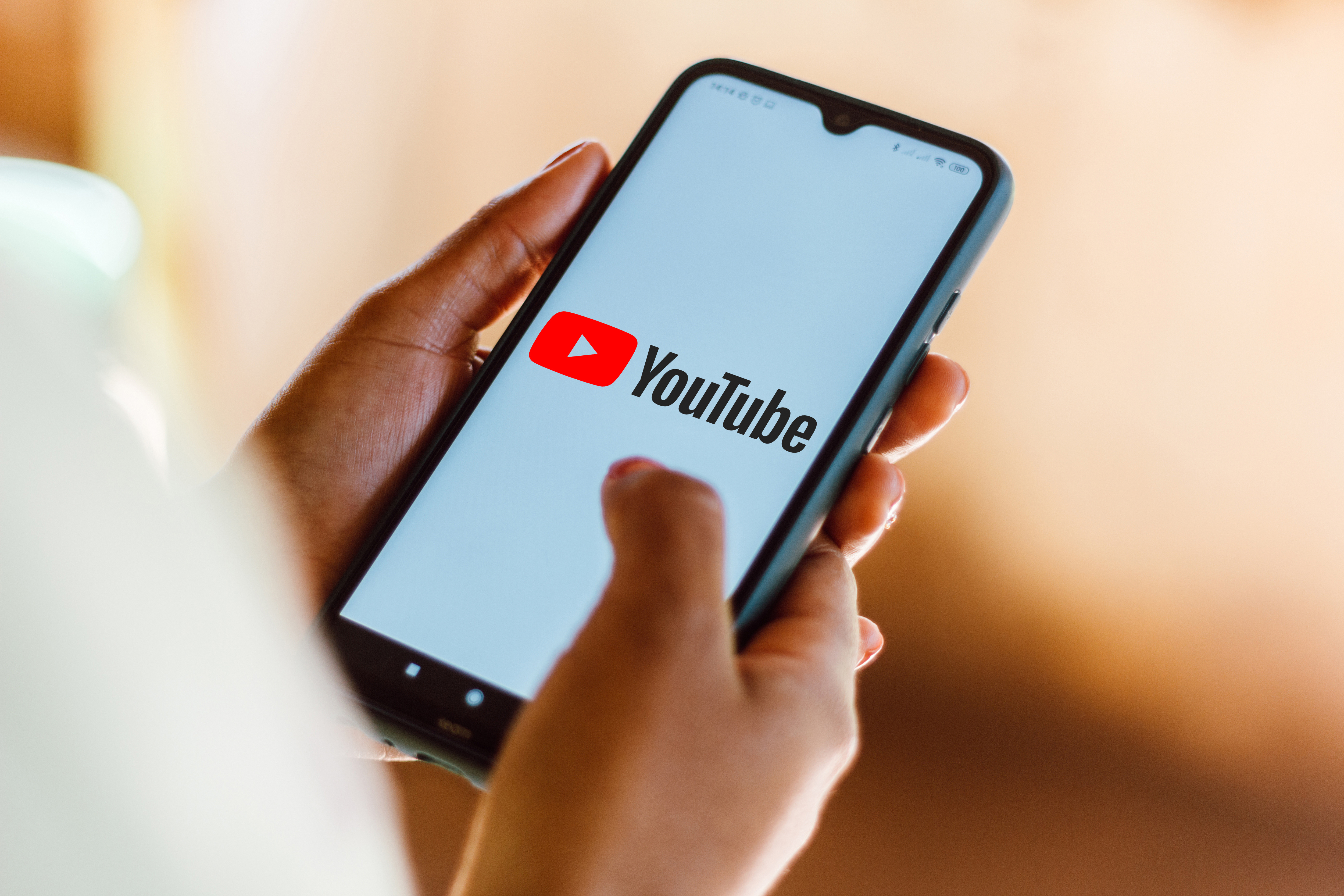 BRAZIL - 2020/10/09: In this photo illustration the YouTube logo seen displayed on a smartphone.