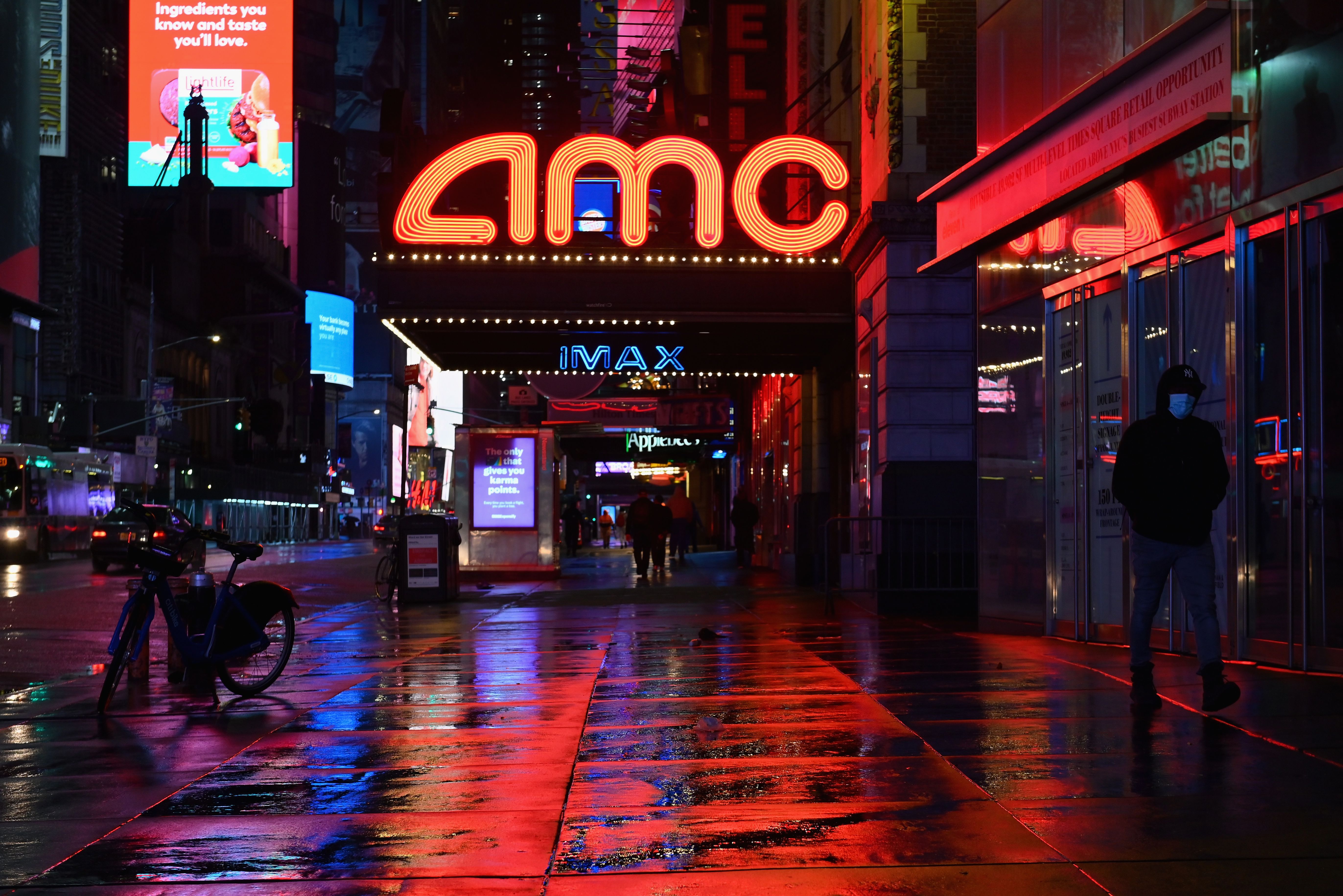 View of a closed AMC movie theater near Time Square on October 12, 2020 in New York City. - The Broadway League, a trade organisation representing producers and theater owners, announced that performances in New York City will be suspended through May 30, 2021 due to the coronavirus outbreak. (Photo by Angela Weiss / AFP) (Photo by ANGELA WEISS/AFP via Getty Images)