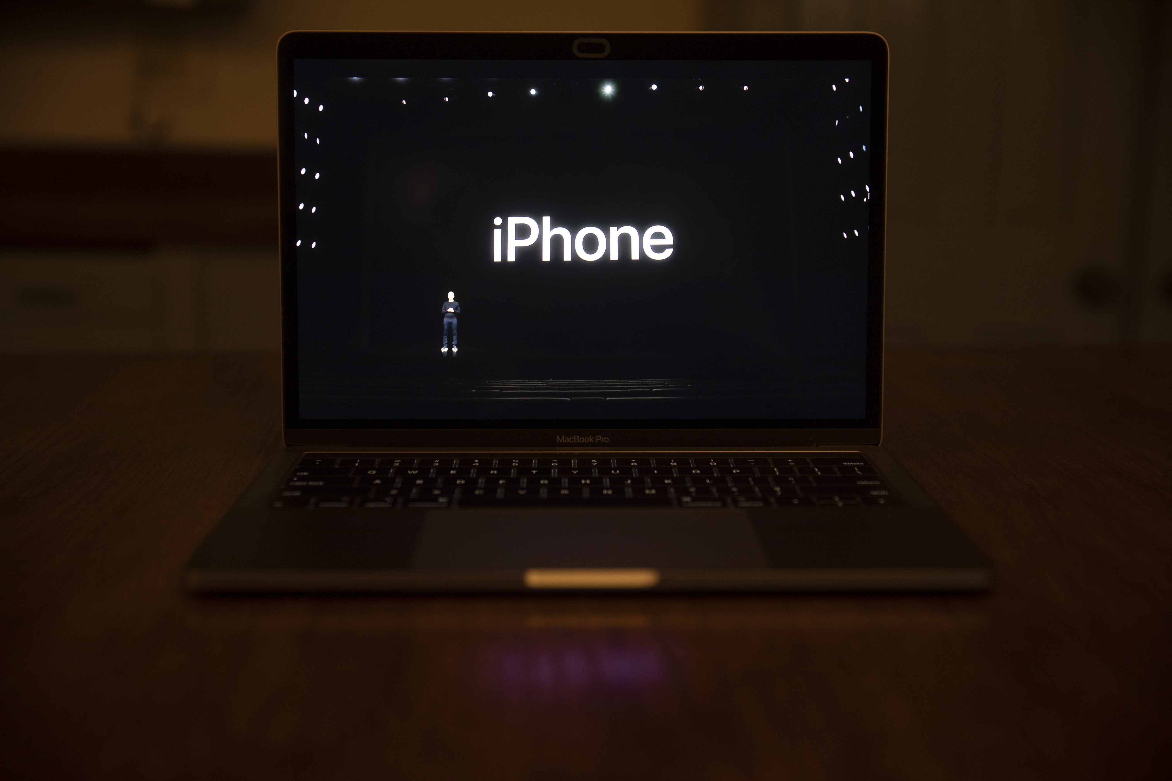 Tim Cook, chief executive officer of Apple, stands on stage during virtual product launch. 