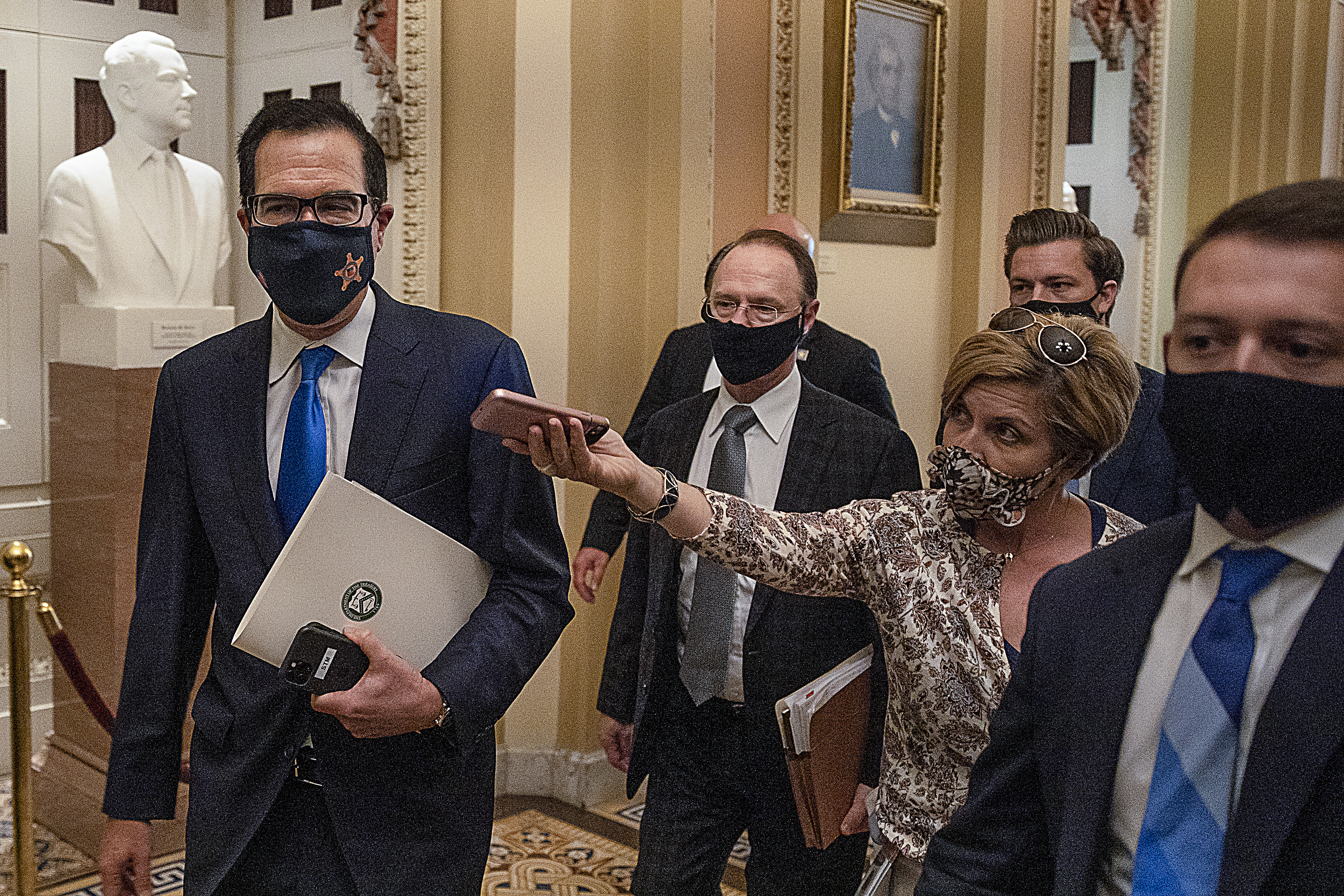 WASHINGTON, DC - SEPTEMBER 30: U.S. Treasury Secretary Steven Mnuchin departs from the office of Senate Majority Leader Mitch McConnell (R-KY) at the U.S. Capitol on September 30, 2020 in Washington, DC. Mnuchin met with Democrats and Republicans about coronavirus relief legislation. (Photo by Tasos Katopodis/Getty Images)