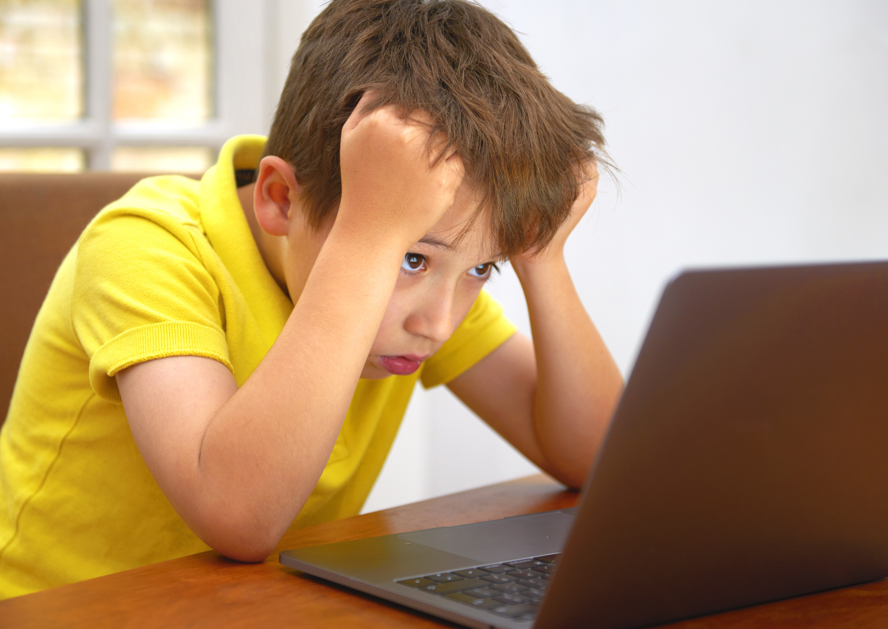 frustrated kid at computer