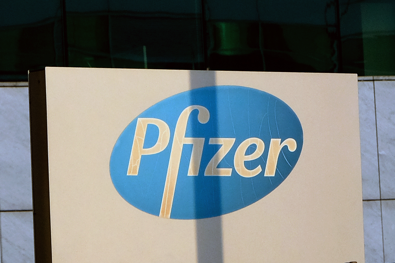A view of the logo Pfizer displayed in front of Italia administrative headquarters in Milan on November 10, 2020 in Milan, Italy.