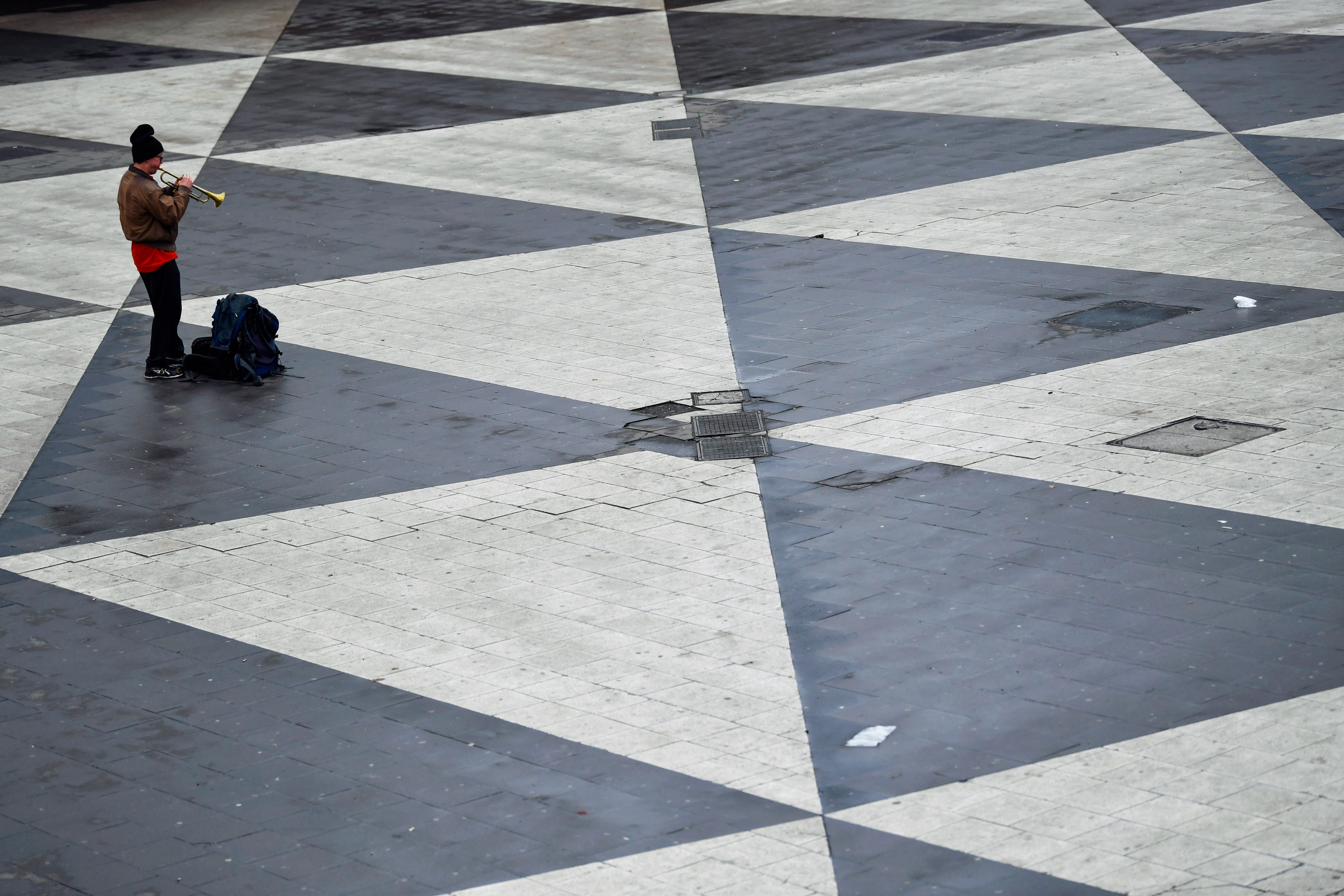 A person plays a trumpet on Sergels Torg in Stockholm, Sweden, on Wednesday, Nov. 11, 2020. The resurgence of Covid-19 across Europe has caught the region off guard after a summer that left many countries assuming theyd brought the virus under control. Photographer: Mikael Sjoberg/Bloomberg via Getty Images