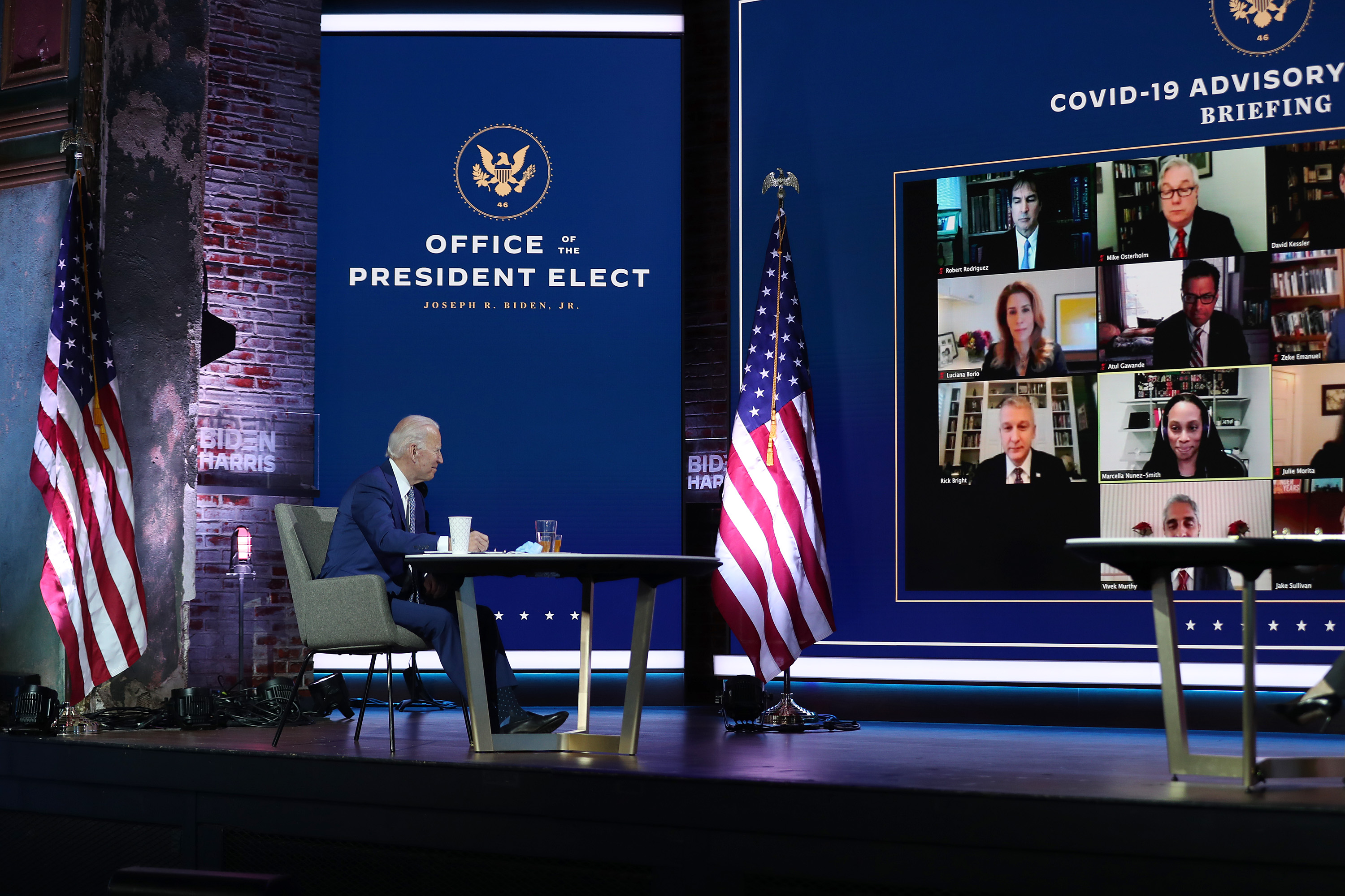 President-elect Joe Biden receives a briefing from the transition COVID-19 advisory board on Nov. 9, 2020, in Wilmington, Del.