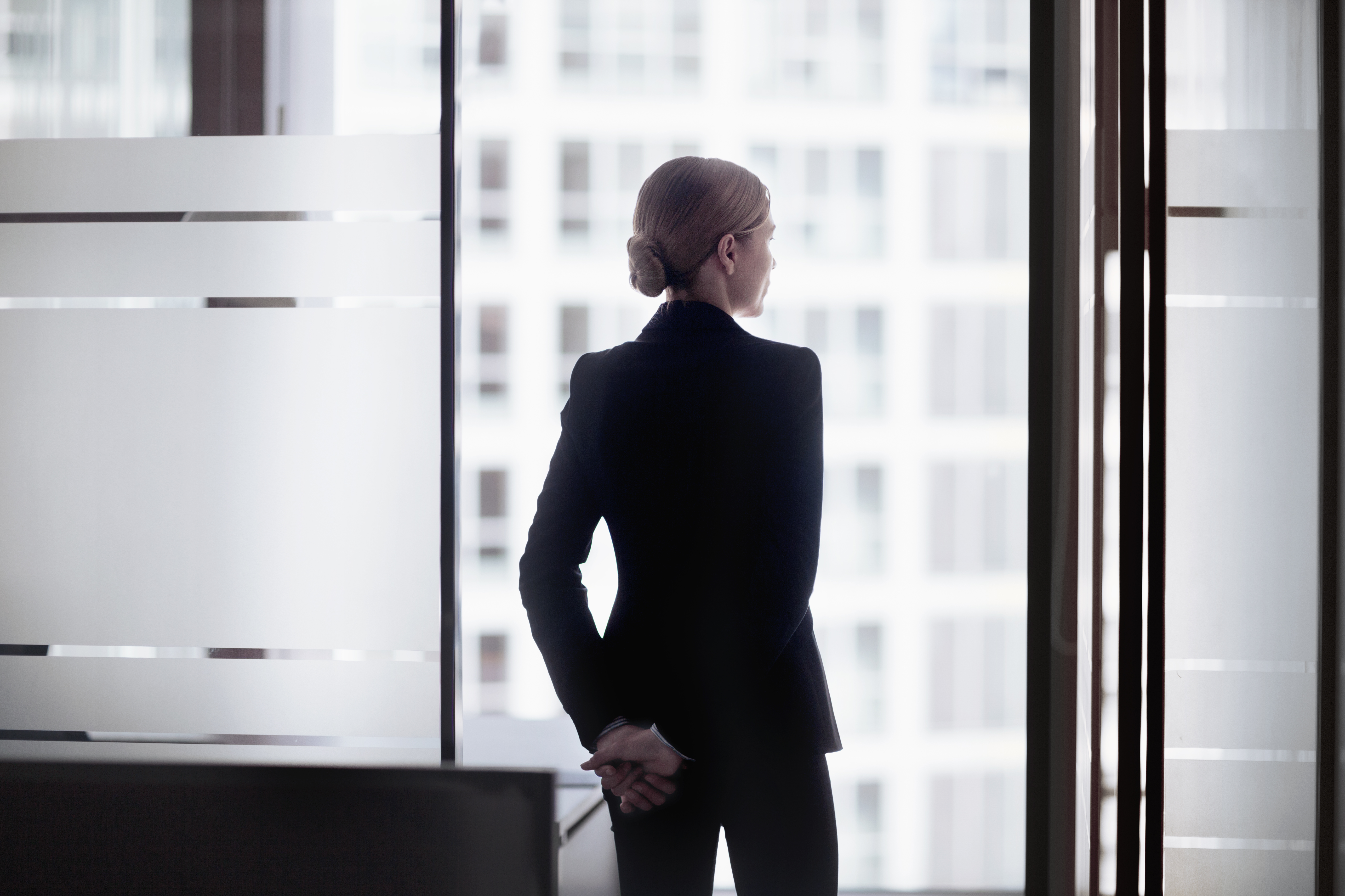 Women in finance must ask for promotions to advance at work, while men don't have to, a new study finds. 