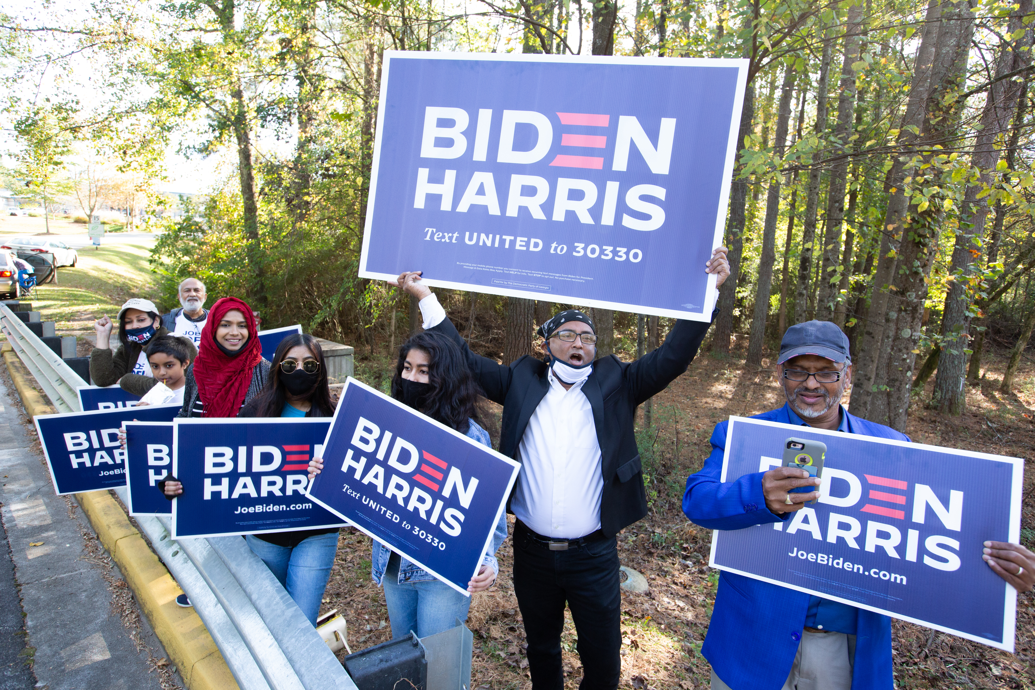 Biden-Harris supporters near a polling station in Norcross, Ga., on Election Day. Barack Obama lost Gwinnett County by nine points in 2012, only to see Joe Biden win it by 18 points just eight years later.