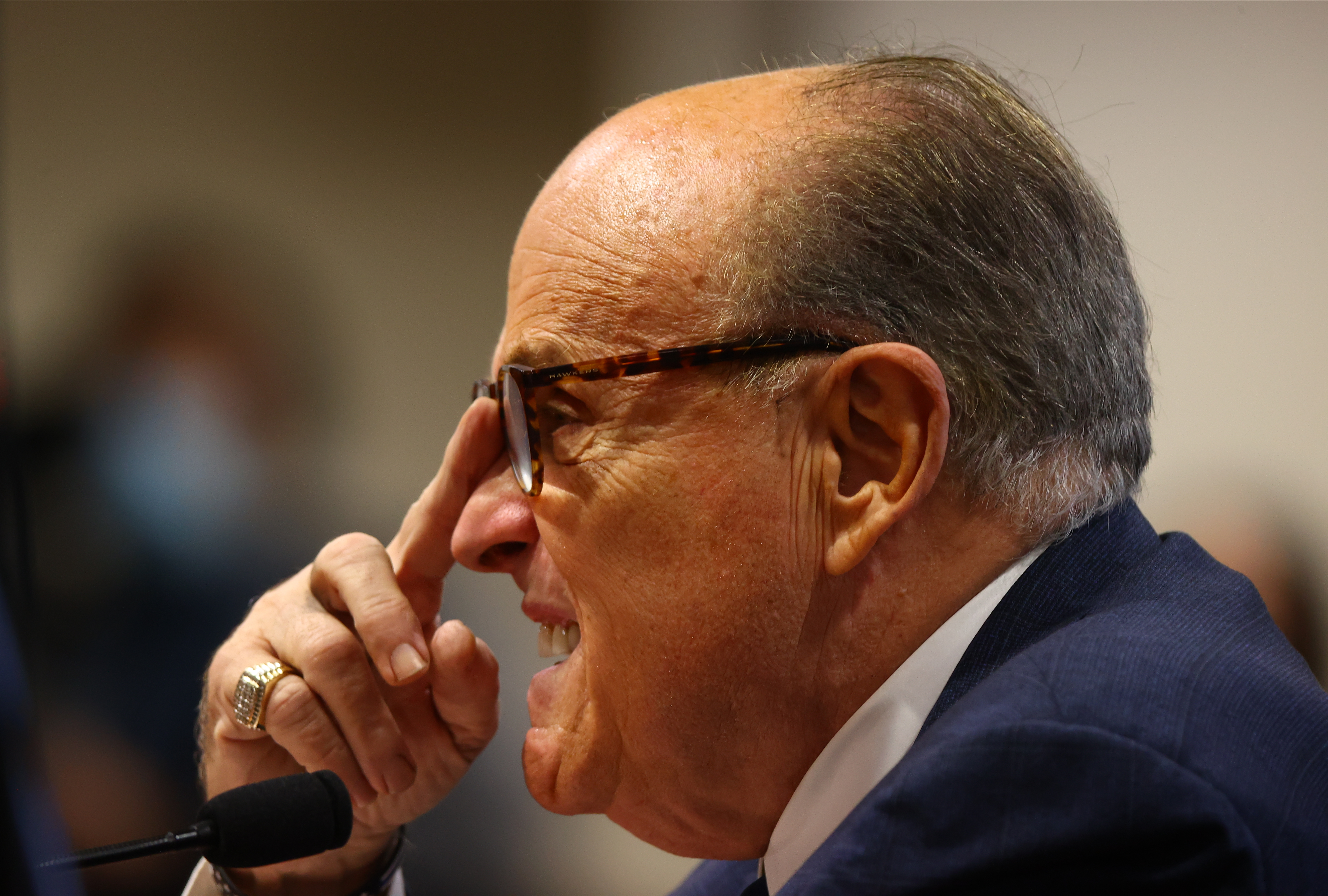 U.S. President Donald Trump's personal attorney Rudy Giuliani speaks during an appearance before the Michigan House Oversight Committee on December 2, 2020 in Lansing, Michigan. Giuliani has tested positive for COVID-19.