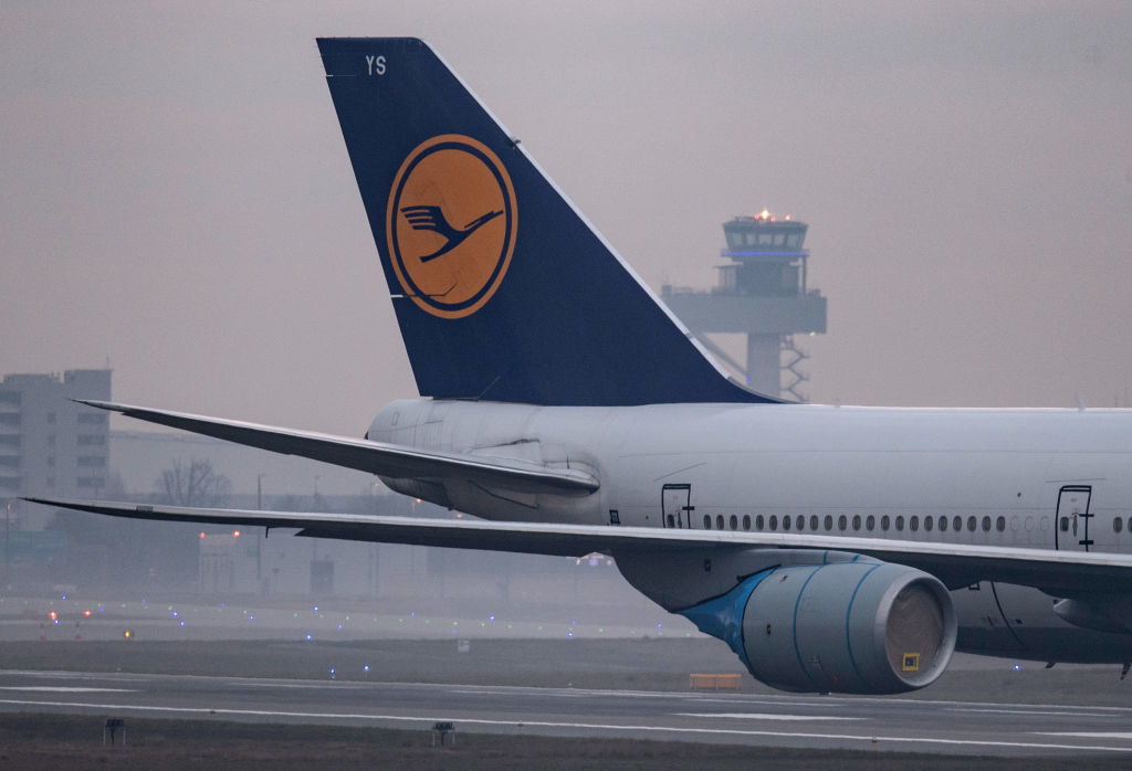 A temporarily immobilized Lufthansa passenger aircraft stands in dense fog on the northwest runway of Frankfurt Airport near the tower. For the second time this year, the runway is being used as a parking lot due to the corona-related lull in the aviation industry.