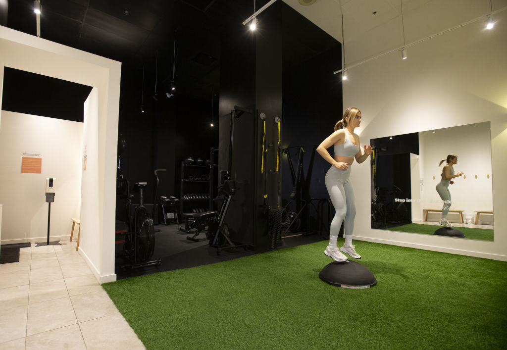 A fitness trainer works out at a Silofit Inc. private gym in Montreal, Quebec, Canada, on Wednesday, Dec. 2, 2020. With the COVID-19 pandemic forcing many big gyms to stay closed, Silofit is rushing to scale up and accelerating plans to enter the $32 billion gym market in the U.S.