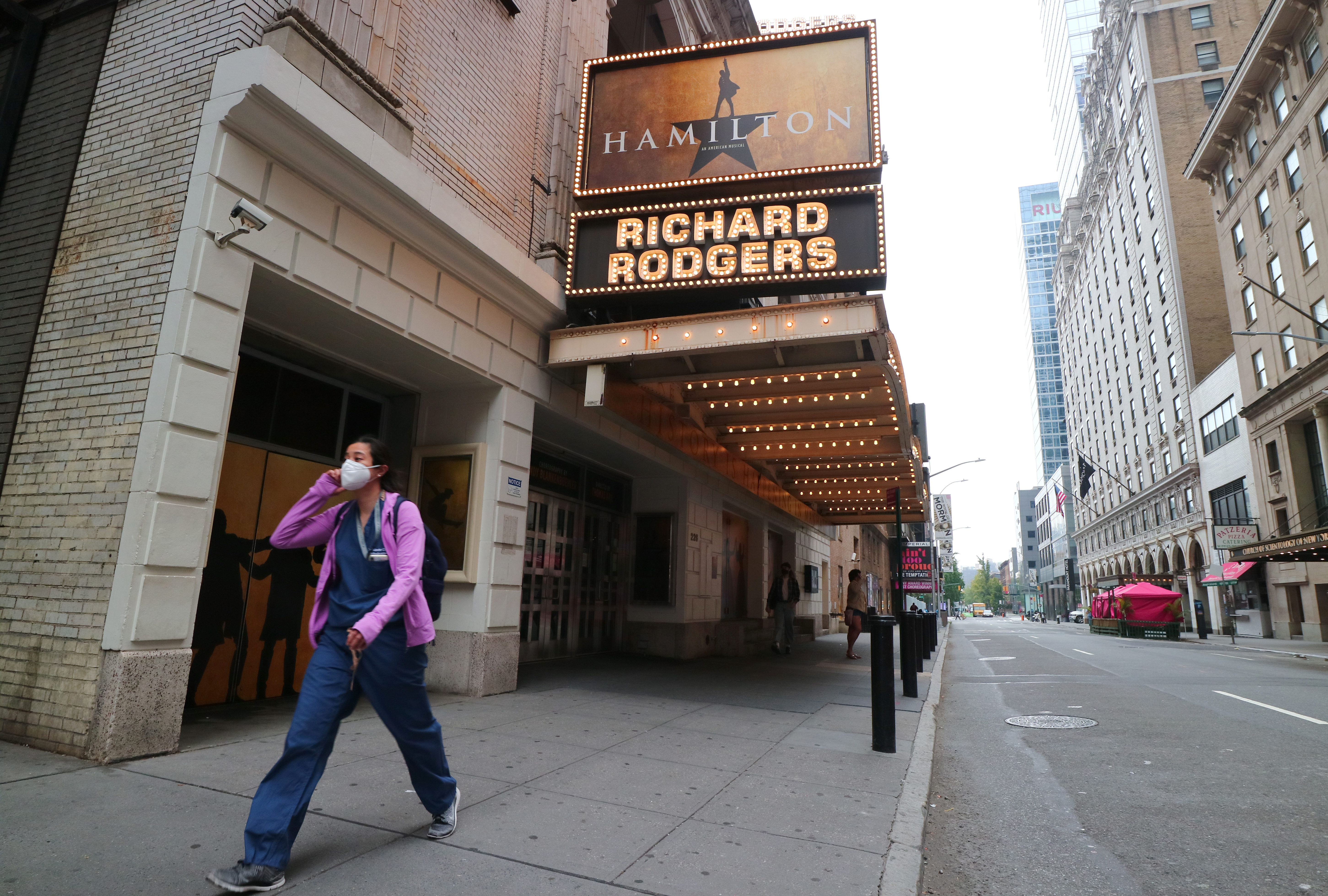 The Richard Rodgers Theatre, host to the Broadway play “Hamilton,” on an empty 46th Street in Times Square on Oct. 22, 2020, in New York City.