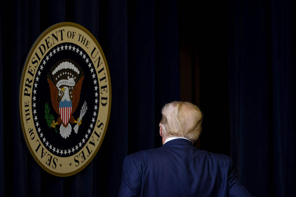 U.S. President Donald Trump walks out after speaking at the Operation Warp Speed Vaccine Summit on December 8, 2020.