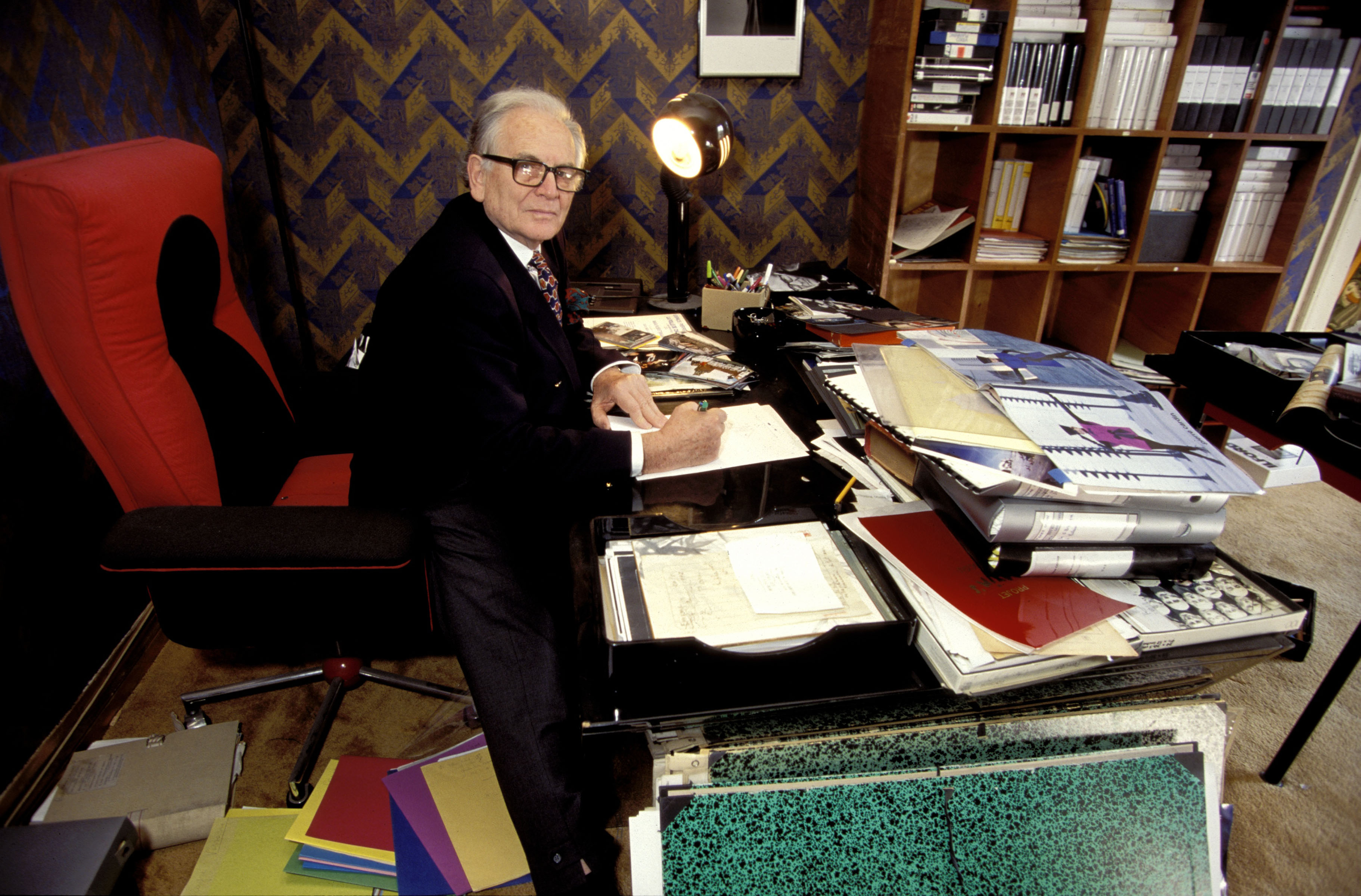 Pierre Cardin, the French master of fashion, at his desk in Paris, France, in 1995.  