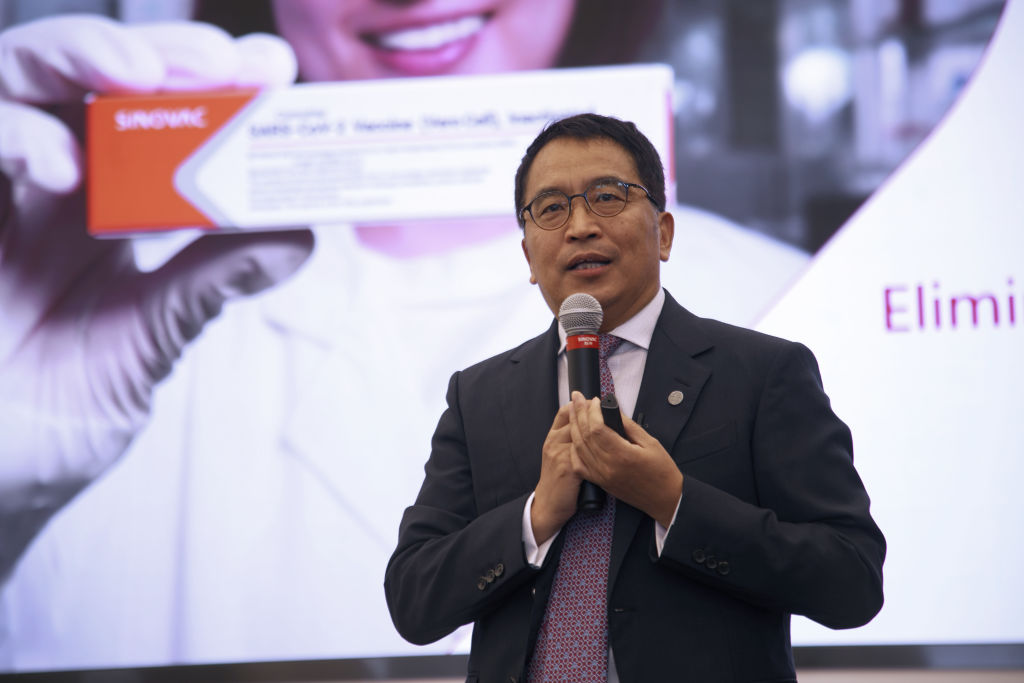 Yin Weidong, chief executive officer of Sinovac Biotech, speaks during a media event in Beijing on Sept. 24, 2020. Chinese vaccine developer Sinovac said that countries running its final-stage clinical trials like Brazil, Indonesia, and Turkey will get its coronavirus shots at the same time as China, underscoring how vaccine supply agreements could cement diplomatic ties in the COVID-19 era.