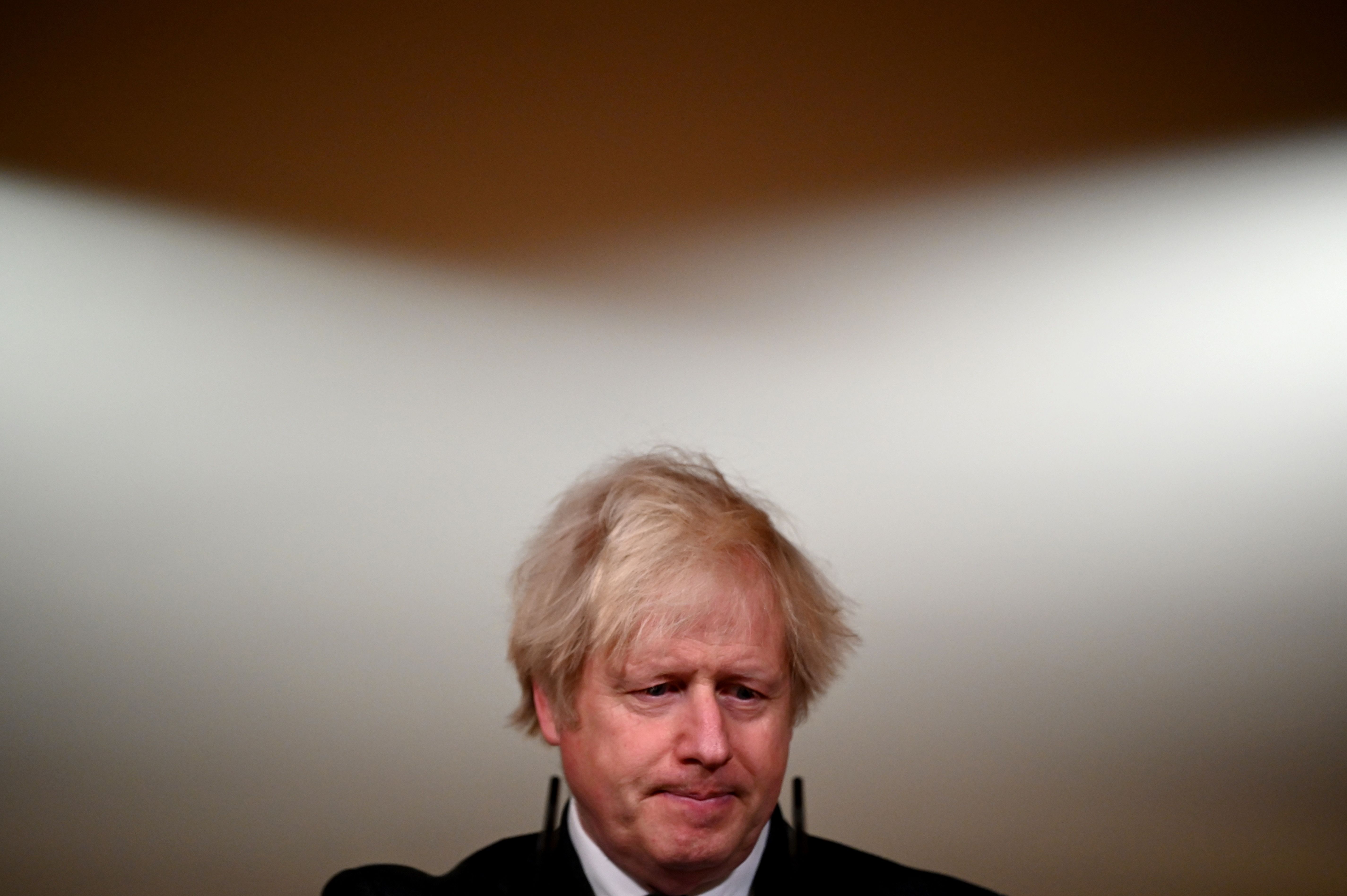 British Prime Minister Boris Johnson was hoping to announce a full reopening of the English economy but has had to delay the easing of restrictions as COVID cases climb.